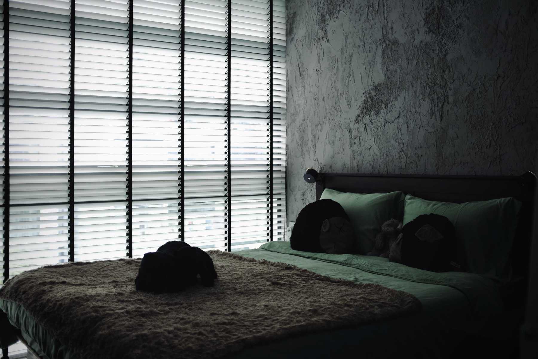 Industrial Bedroom with Vinyl Flooring and Built-in Bed