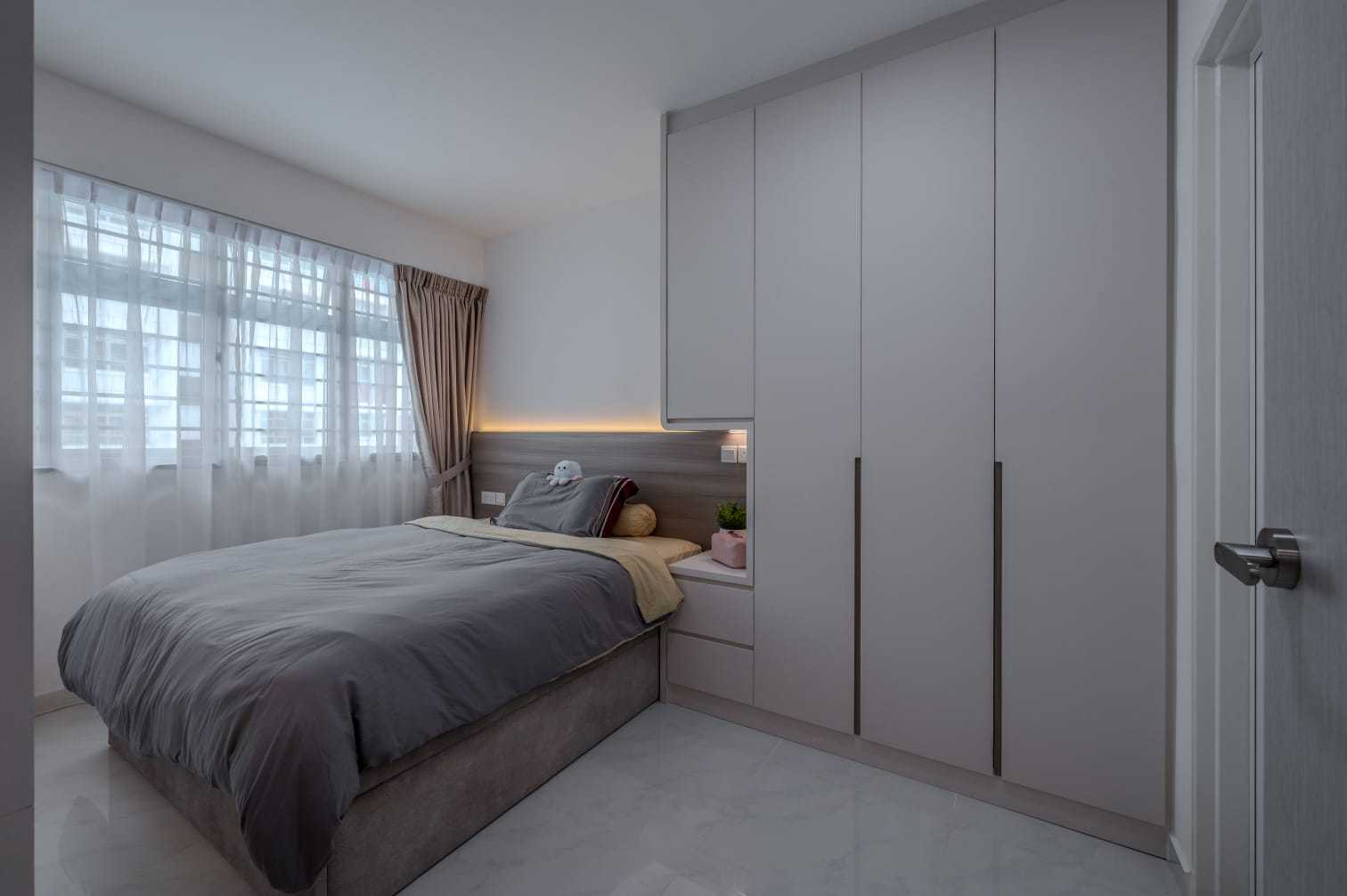 Modern Bedroom with Homogeneous Tiles and Wardrobe
