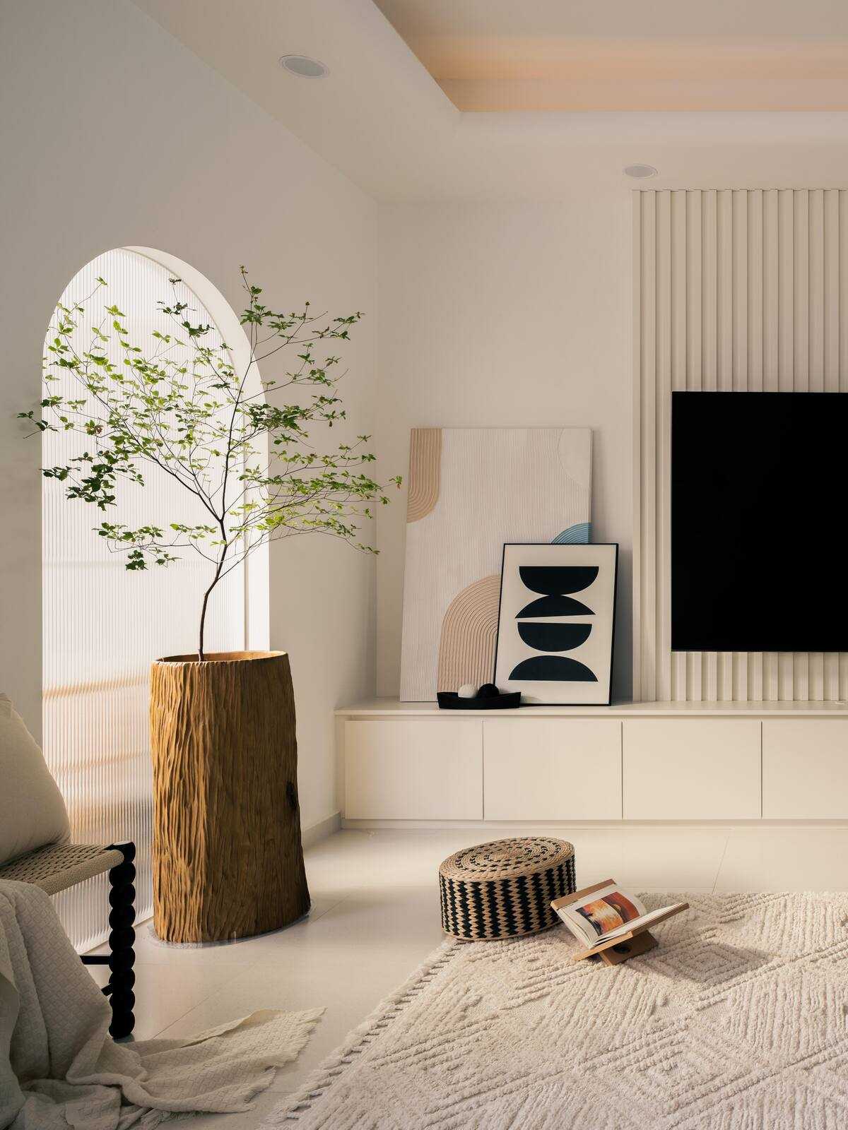 Minimalist Living Room with Homogeneous Tiles and TV Console