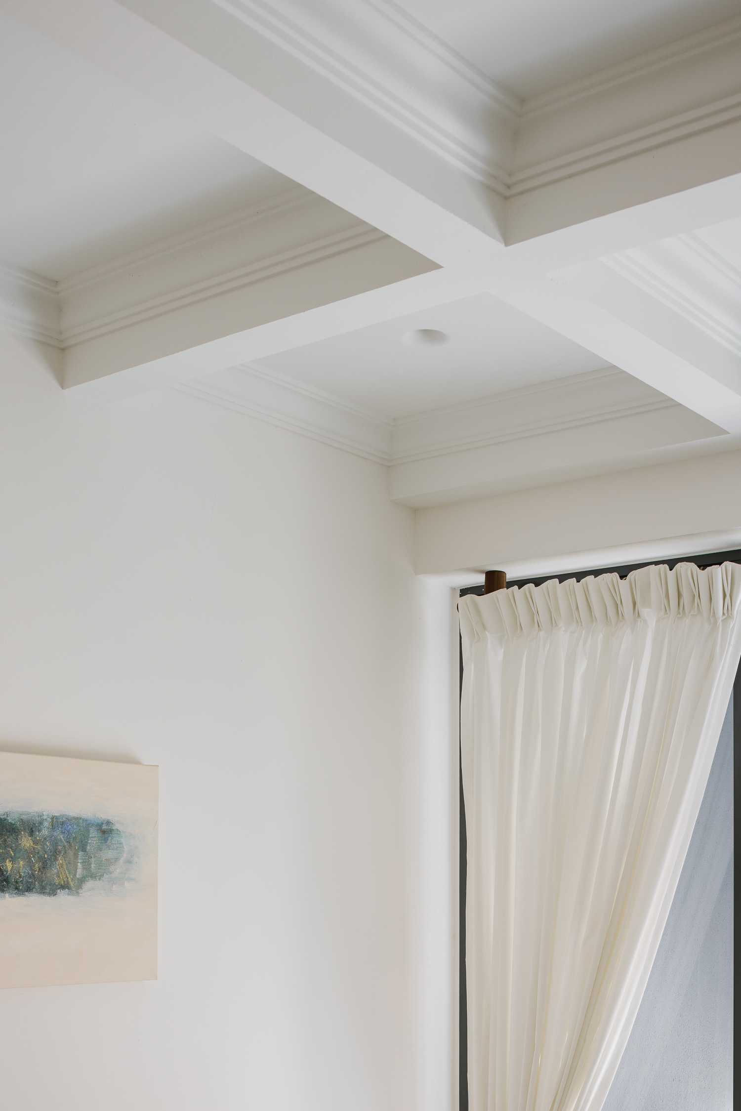 Modern Living Room with Drop Ceiling and Artwork