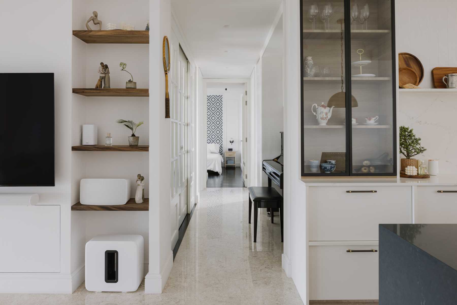 Modern Hallway with Marble Floor and Artwork