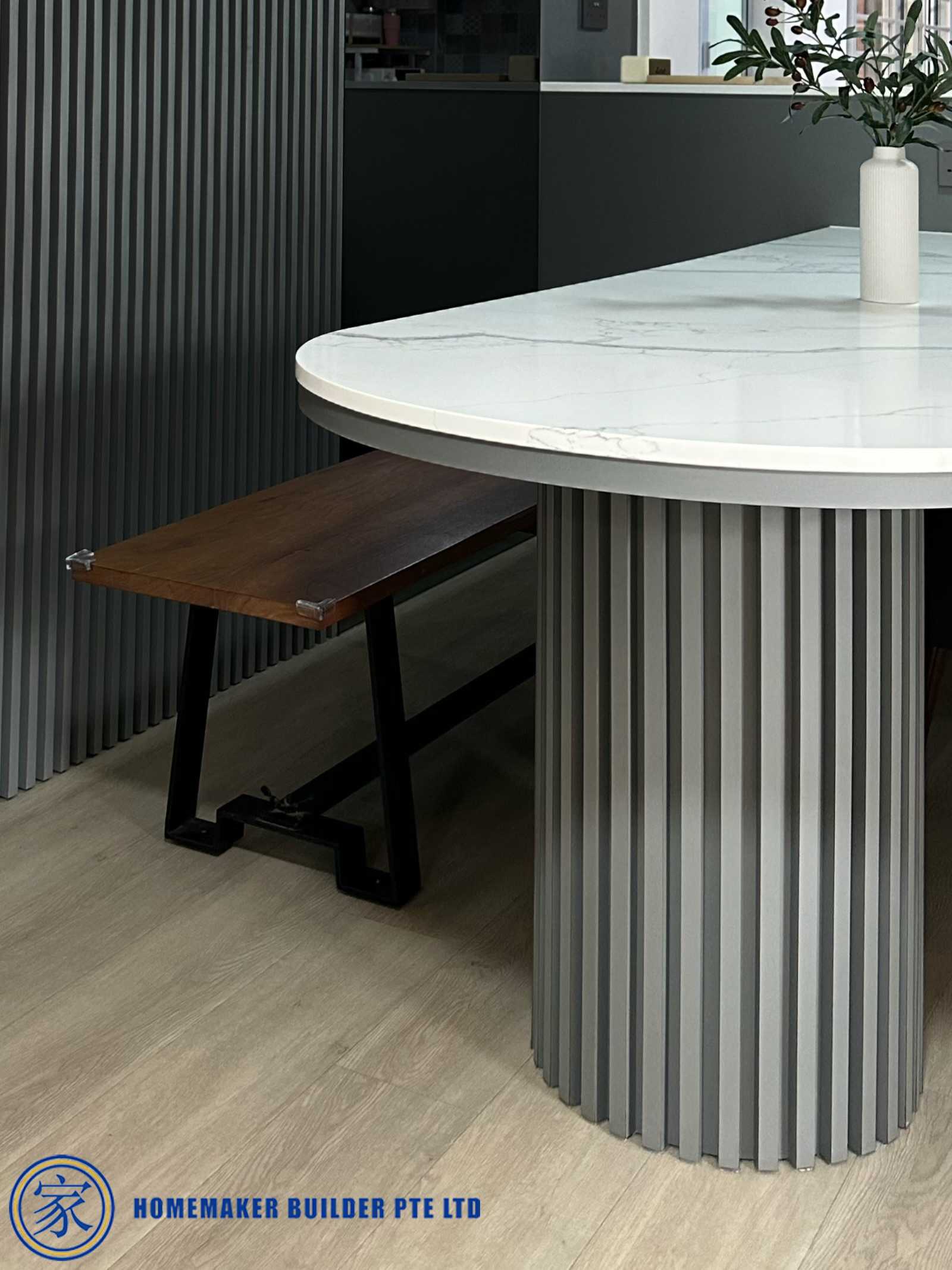 Contemporary Dining Room with Countertop and Feature Wall