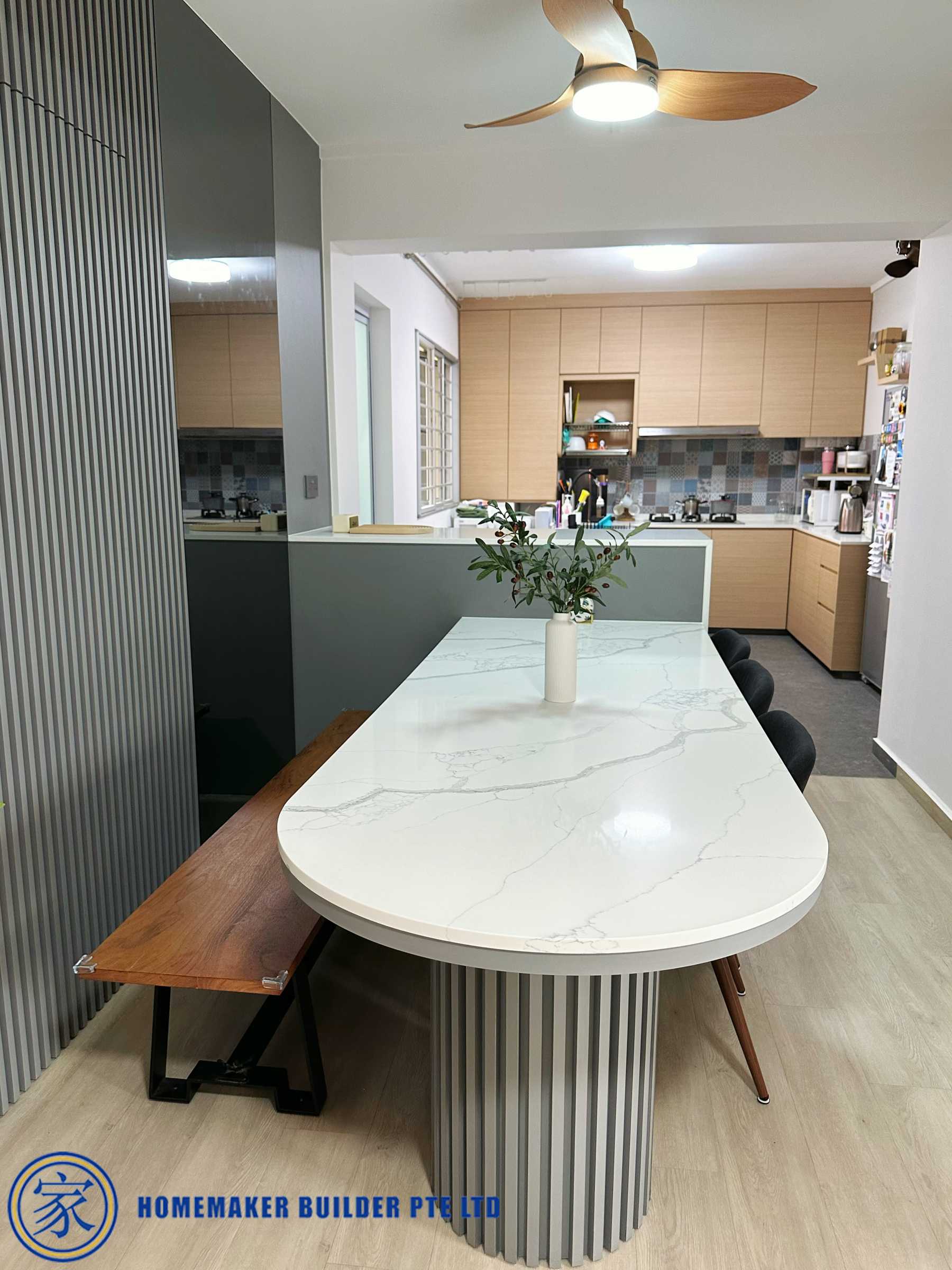 Contemporary Dining Room with Countertop and Feature Wall