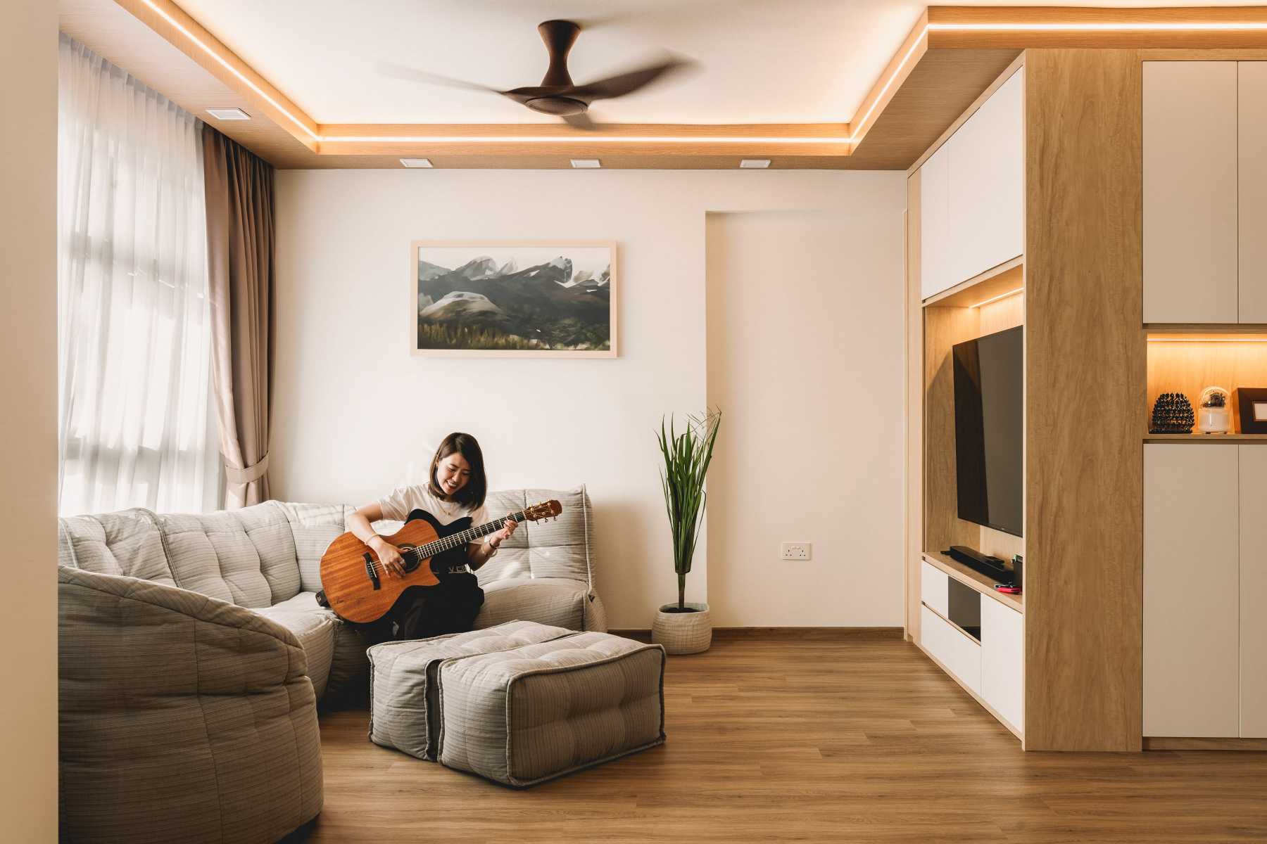 Scandinavian Living Room with Wood Flooring and TV Console