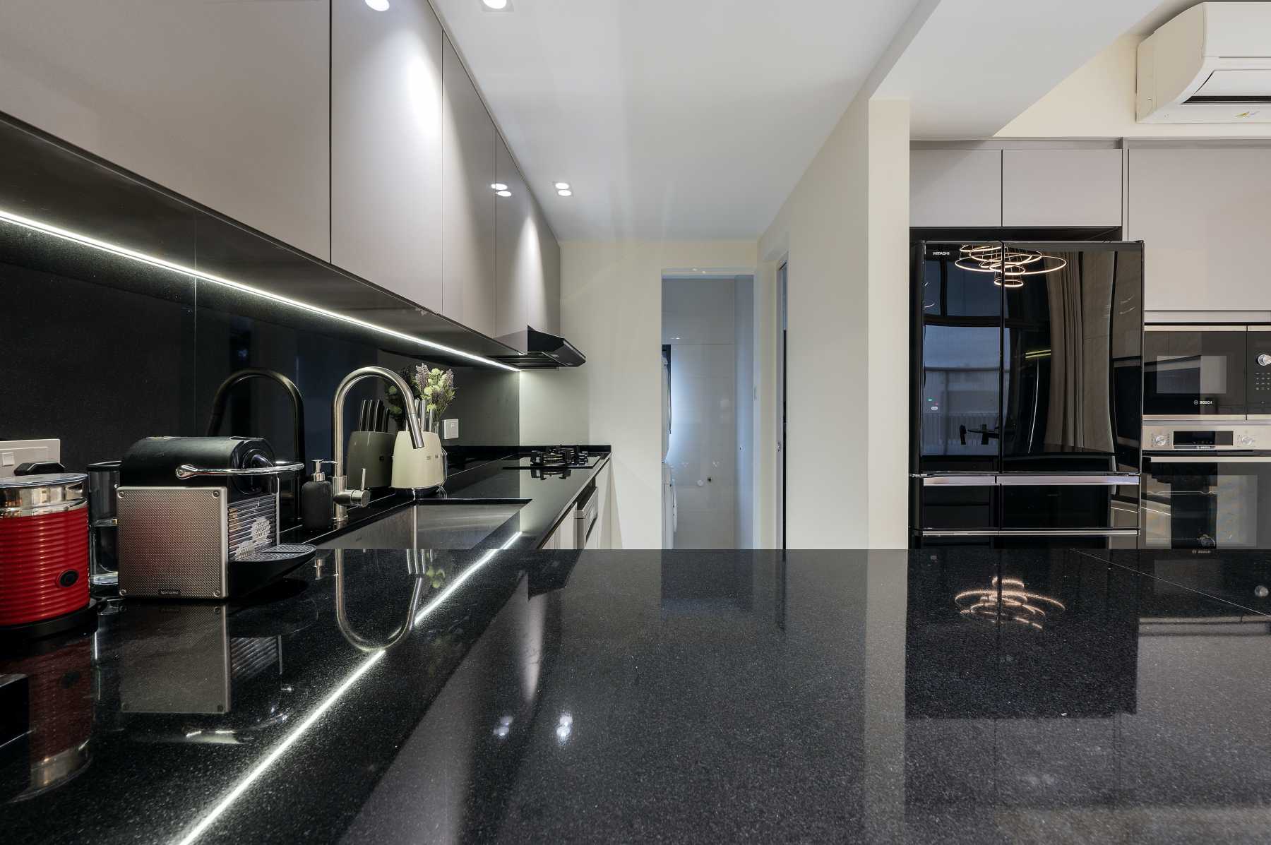 Minimalist Kitchen with Countertop and Homogeneous Tiles