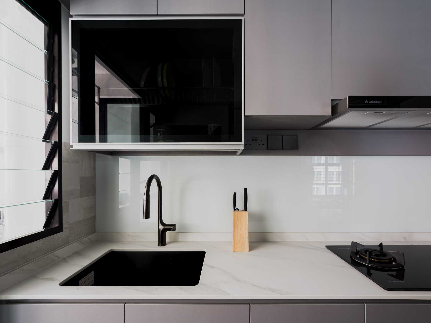Minimalist Kitchen with Countertop and Cupboard