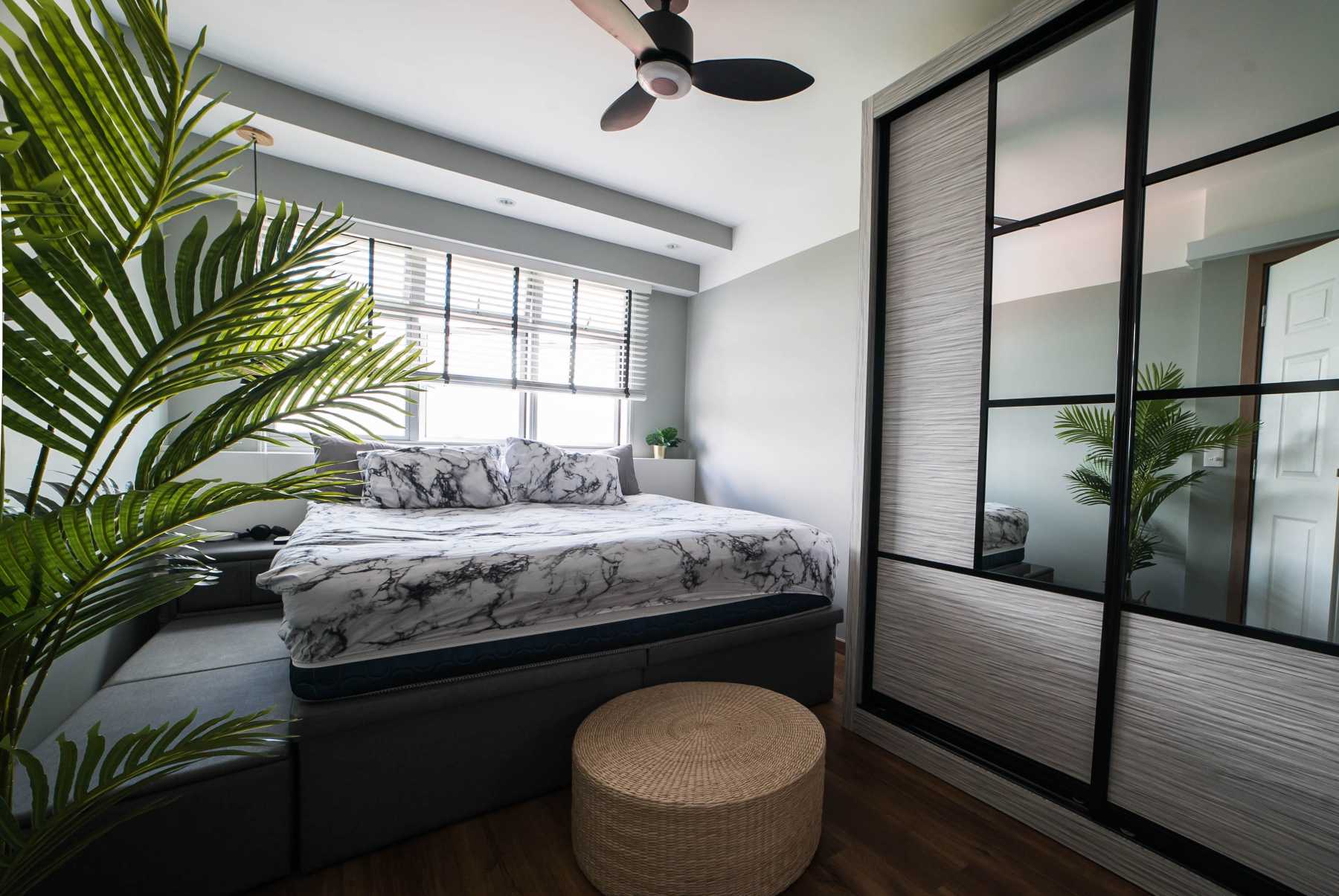 Industrial Bedroom with Platform Bed and Wood Flooring