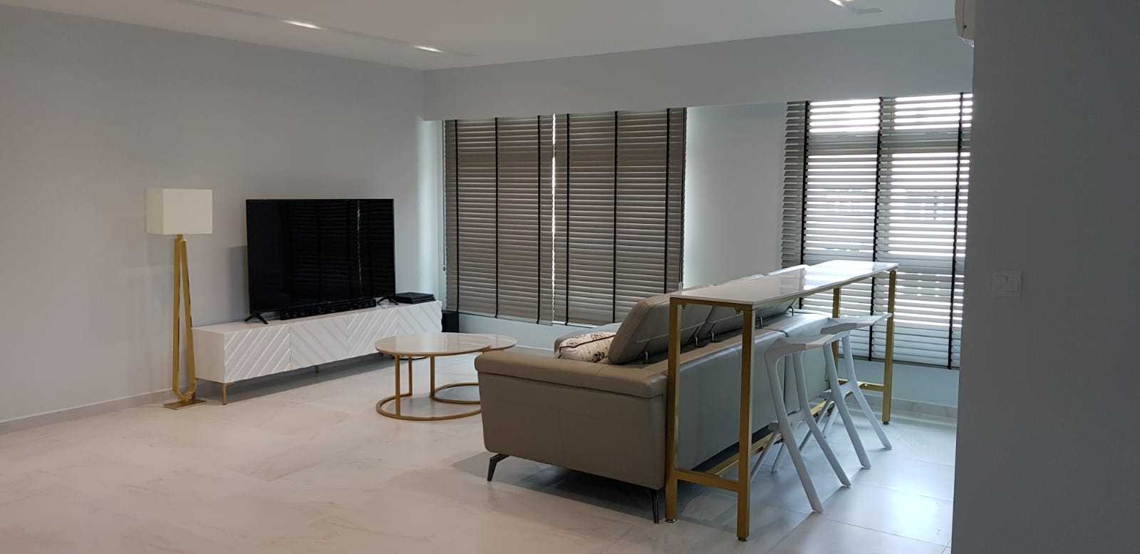 Minimalist Living Room with TV Console and Coffee Table