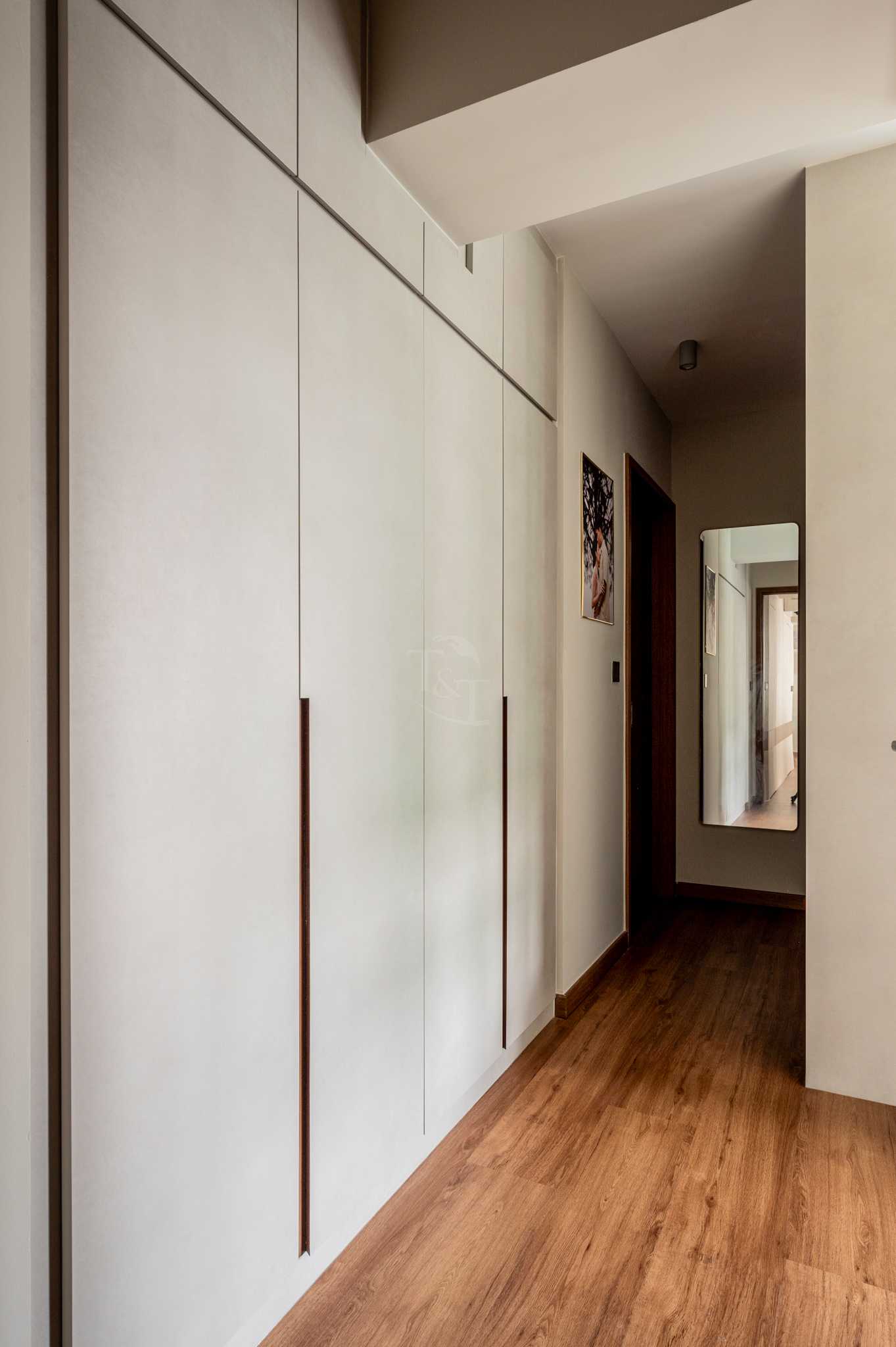 Modern Bedroom with Wood Flooring and Drop Light