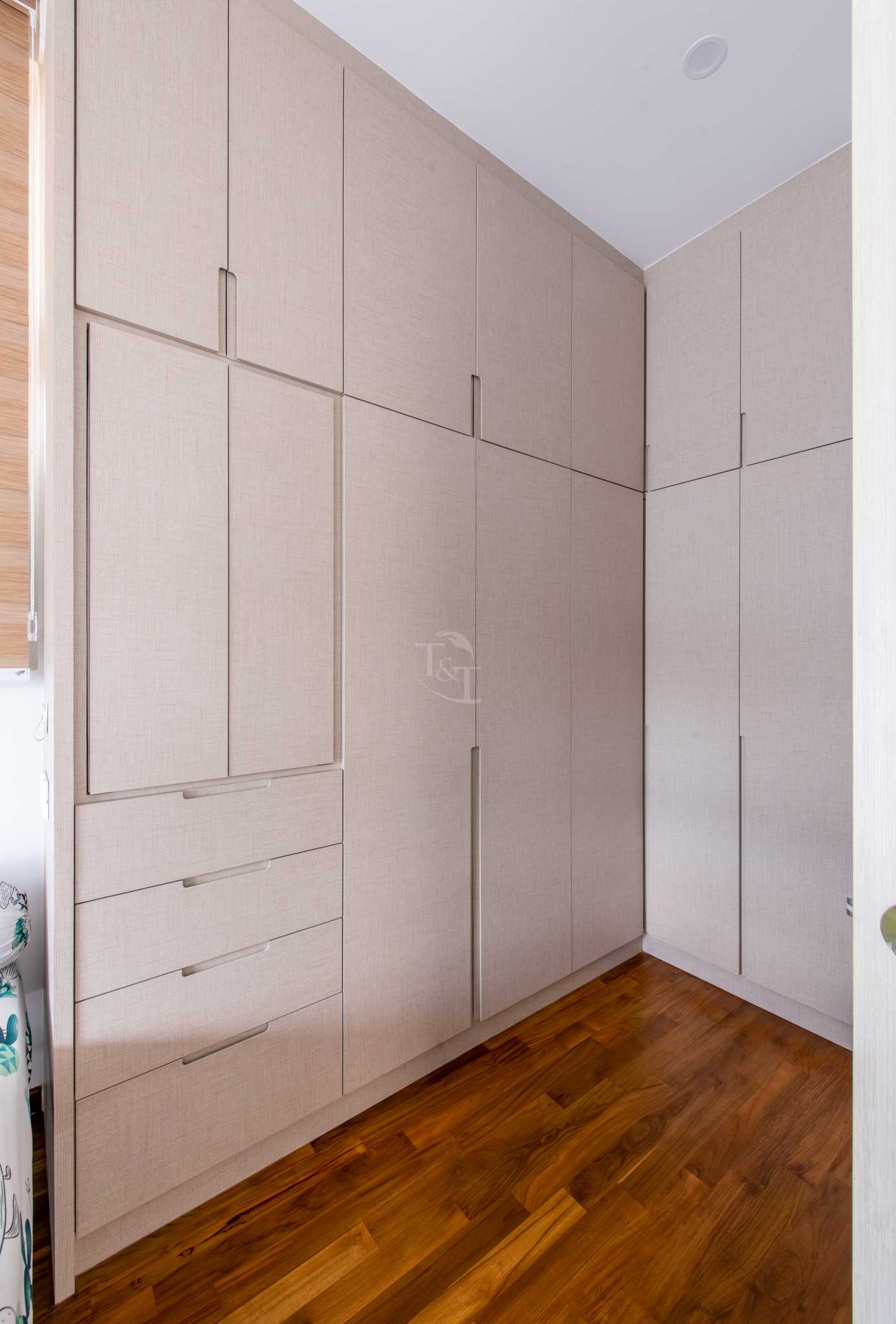 Eclectic Bedroom with Wood Flooring and Wardrobe