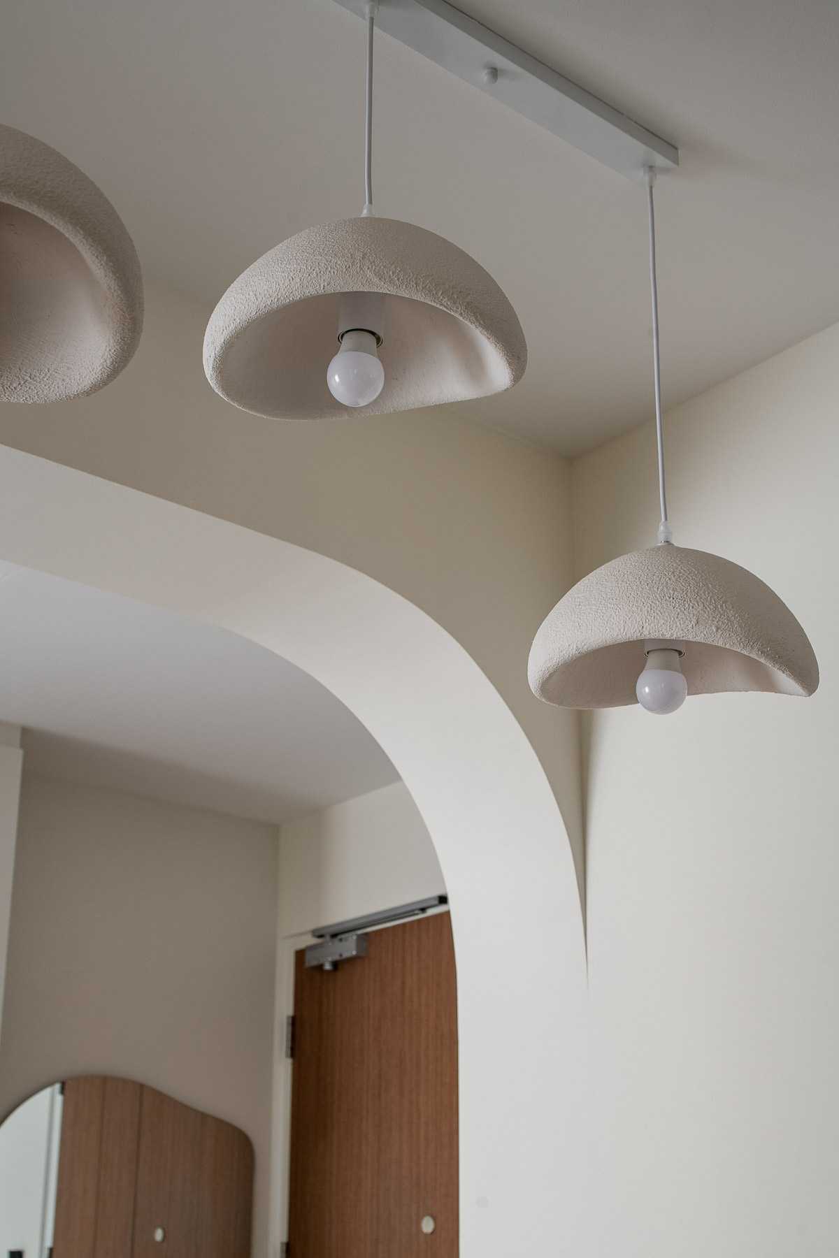 Modern Dining Room with Drop Light and Chandelier