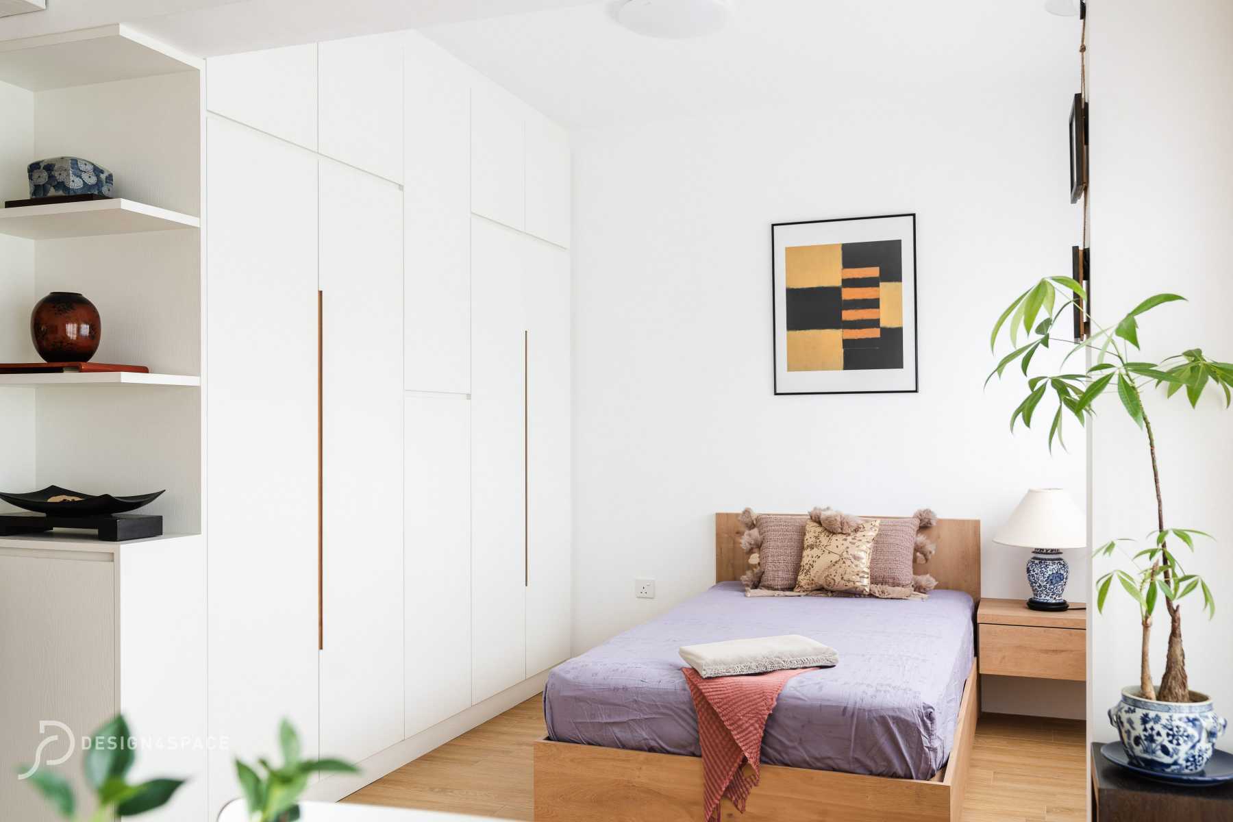 Minimalist Bedroom with Bookshelf and Closet
