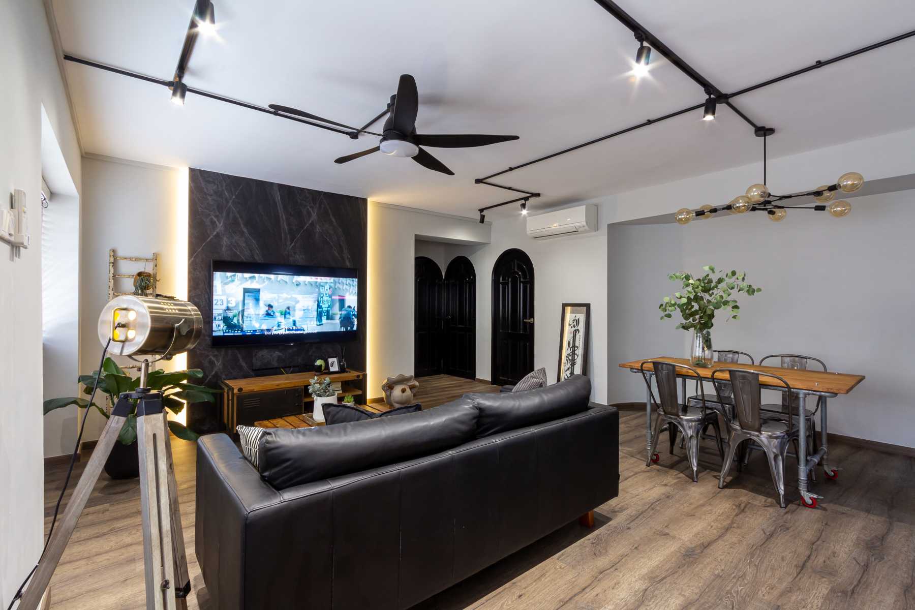 Industrial Living Room with TV Console and Drop Light