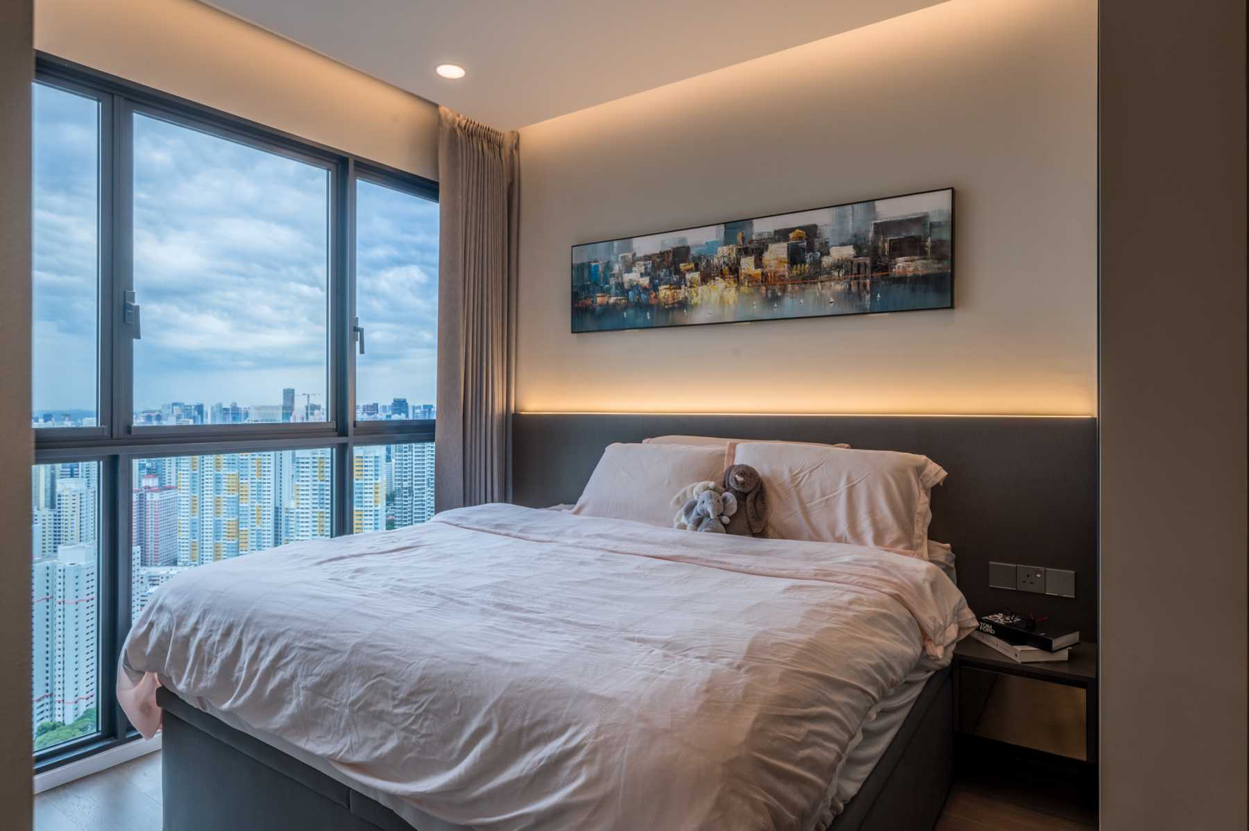 Modern Bedroom with Bay Window and Cove Lighting