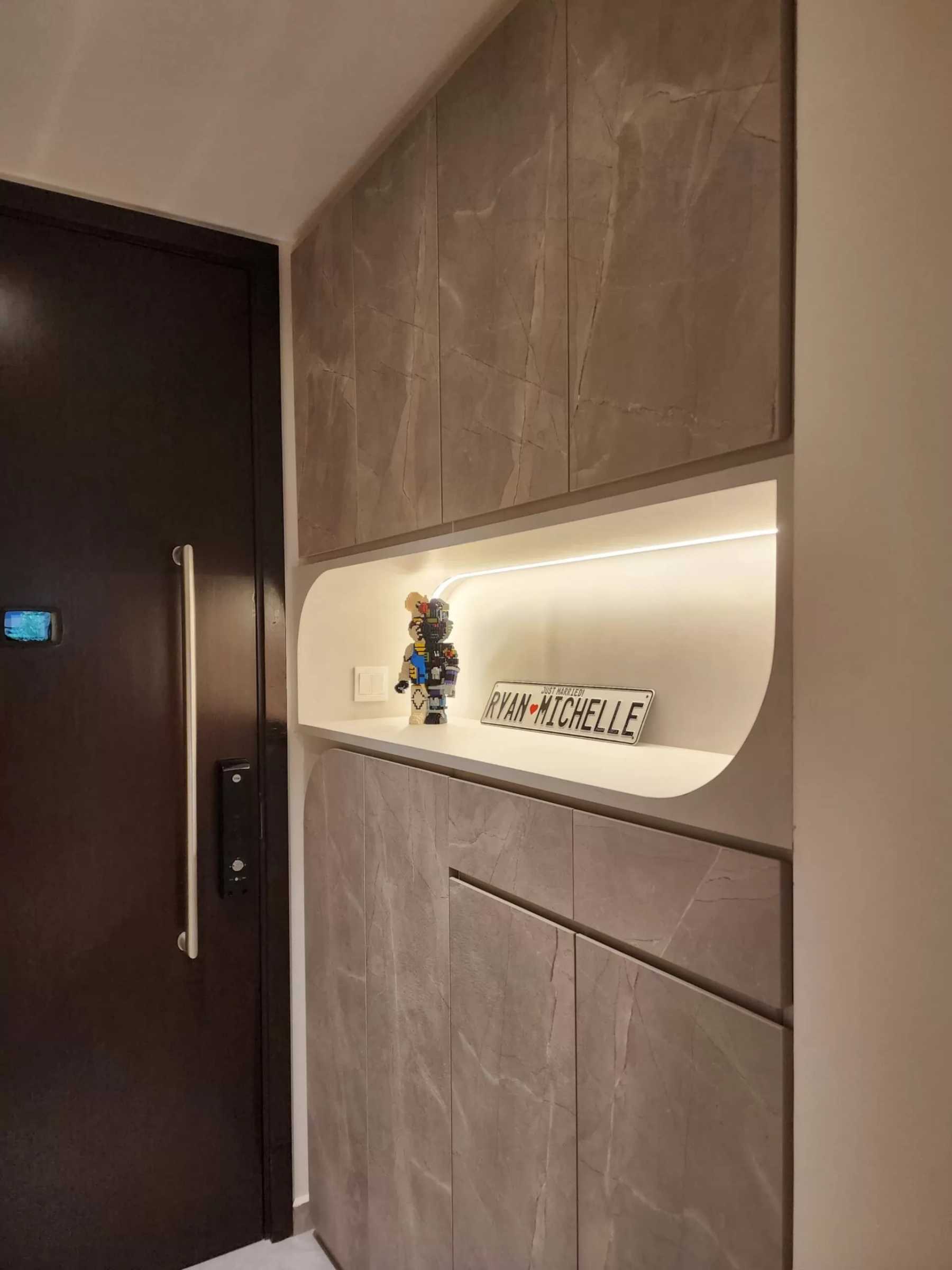 Contemporary Entryway with Shoe Cabinets and Doors