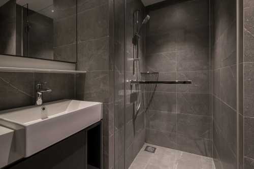 Contemporary Bathroom at 2 Bedroom Condo @ Riverfront
