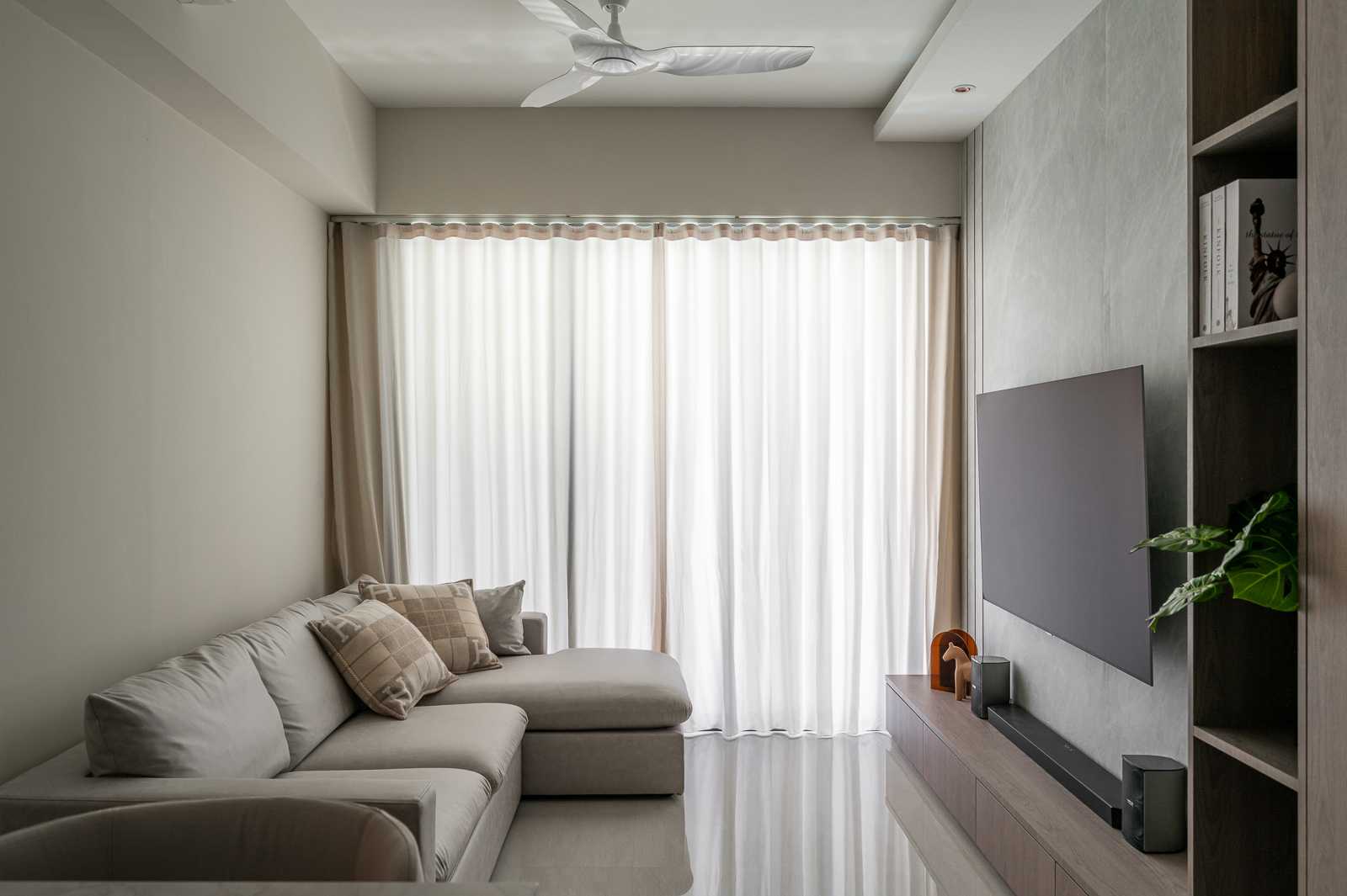 Modern Living Room with Bookshelf and TV Console