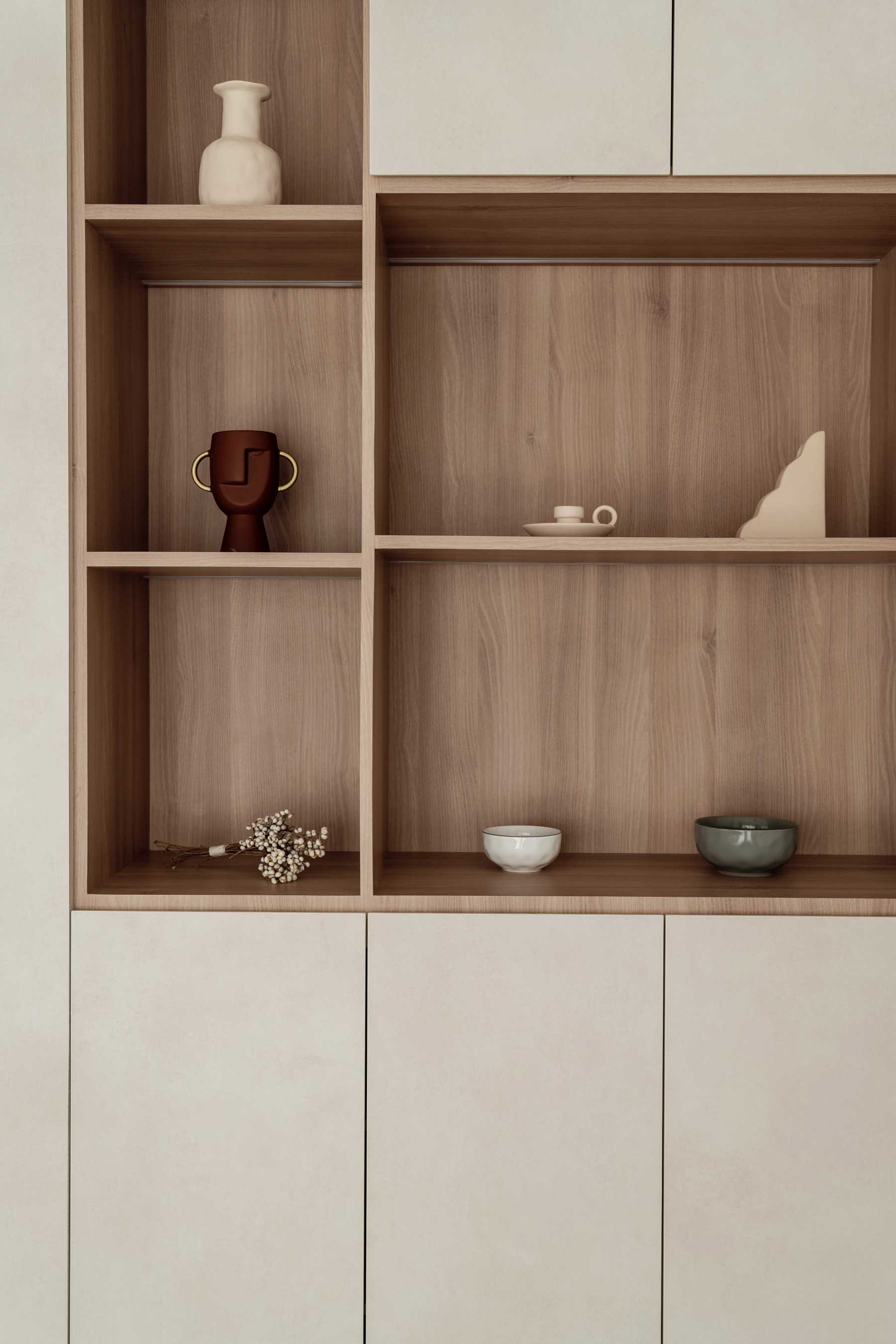 Scandinavian Living Room with Bookshelf and Wood Flooring