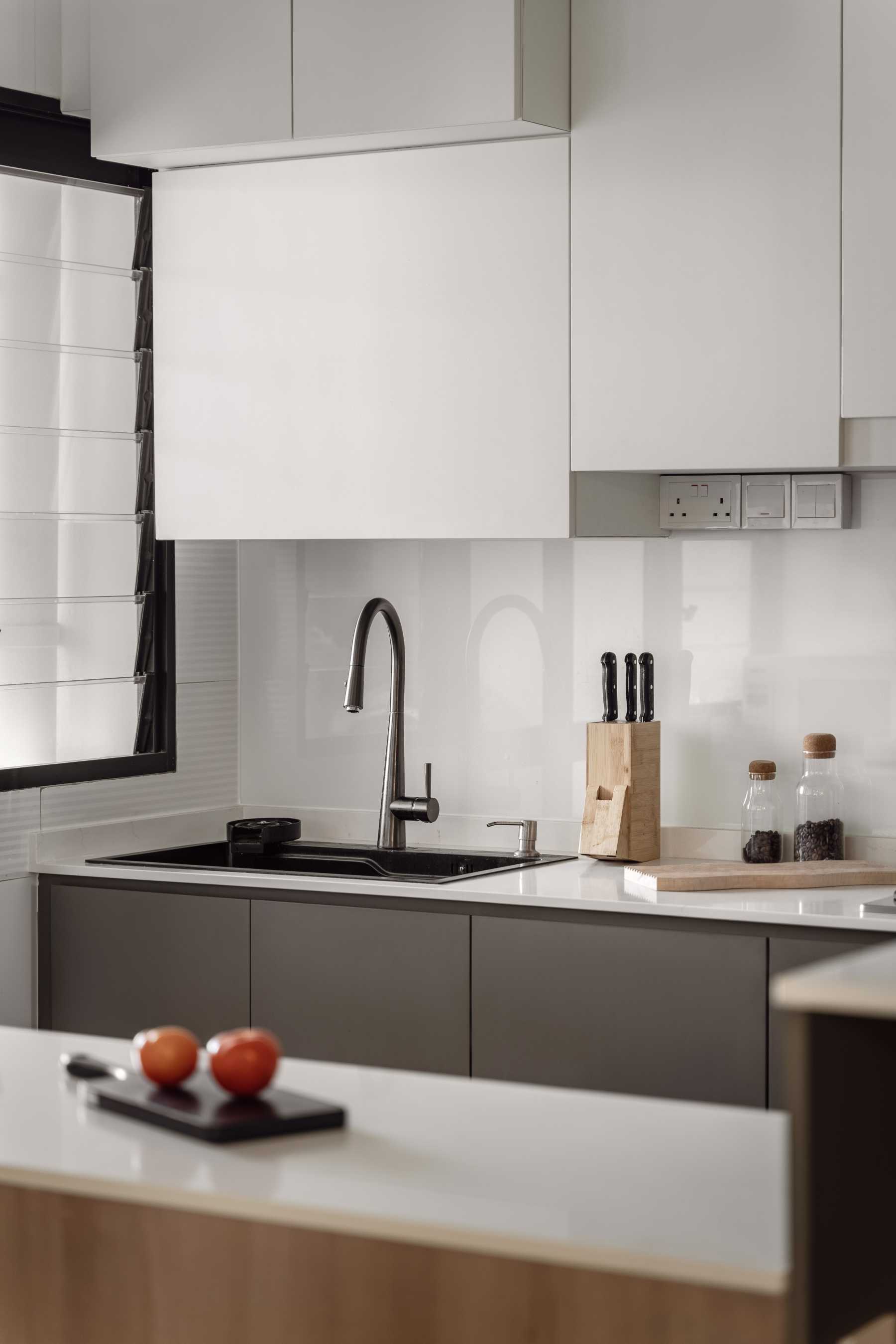Scandinavian Kitchen with Countertop and Wood Flooring
