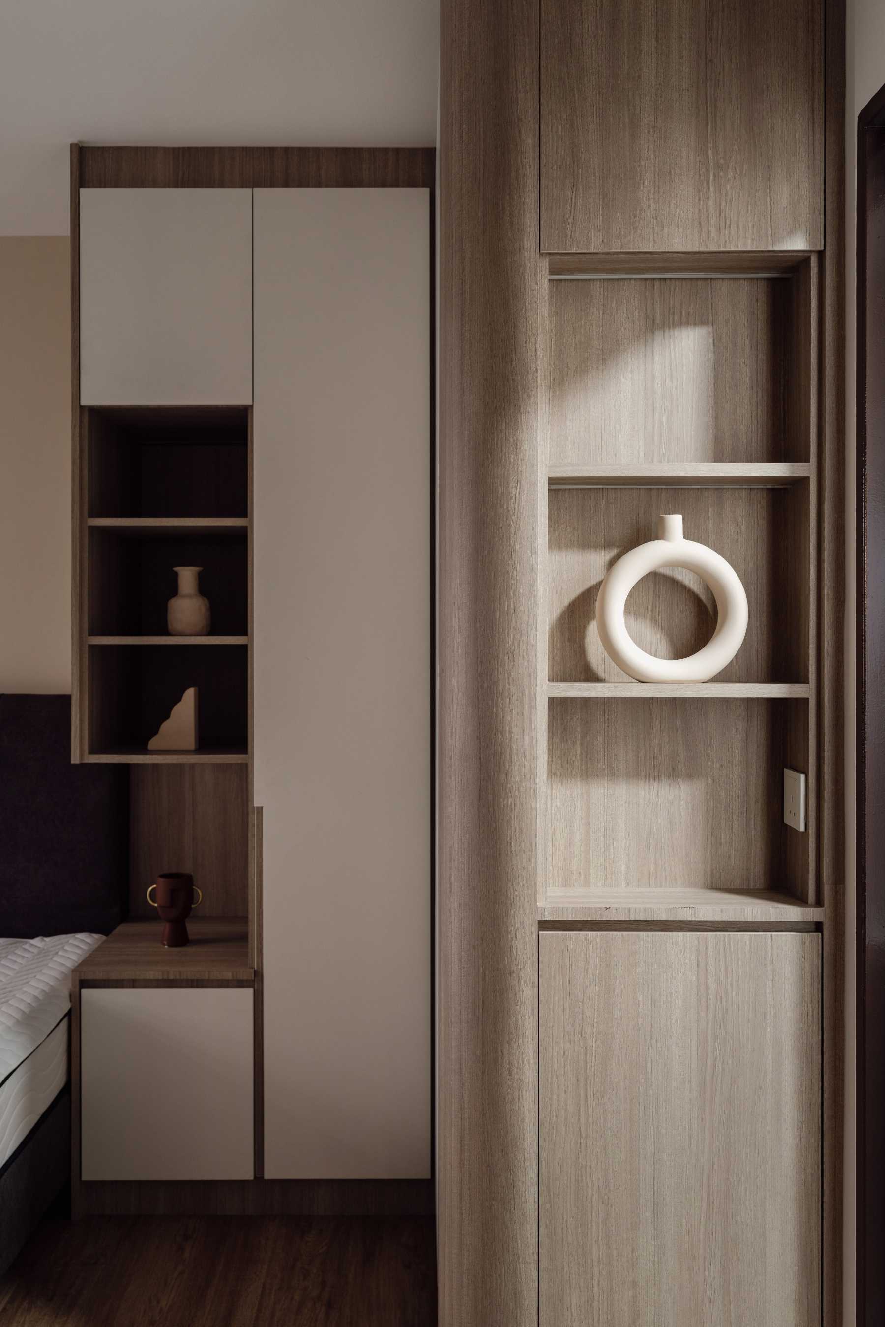 Scandinavian Bedroom with Bookshelf and Wood Flooring