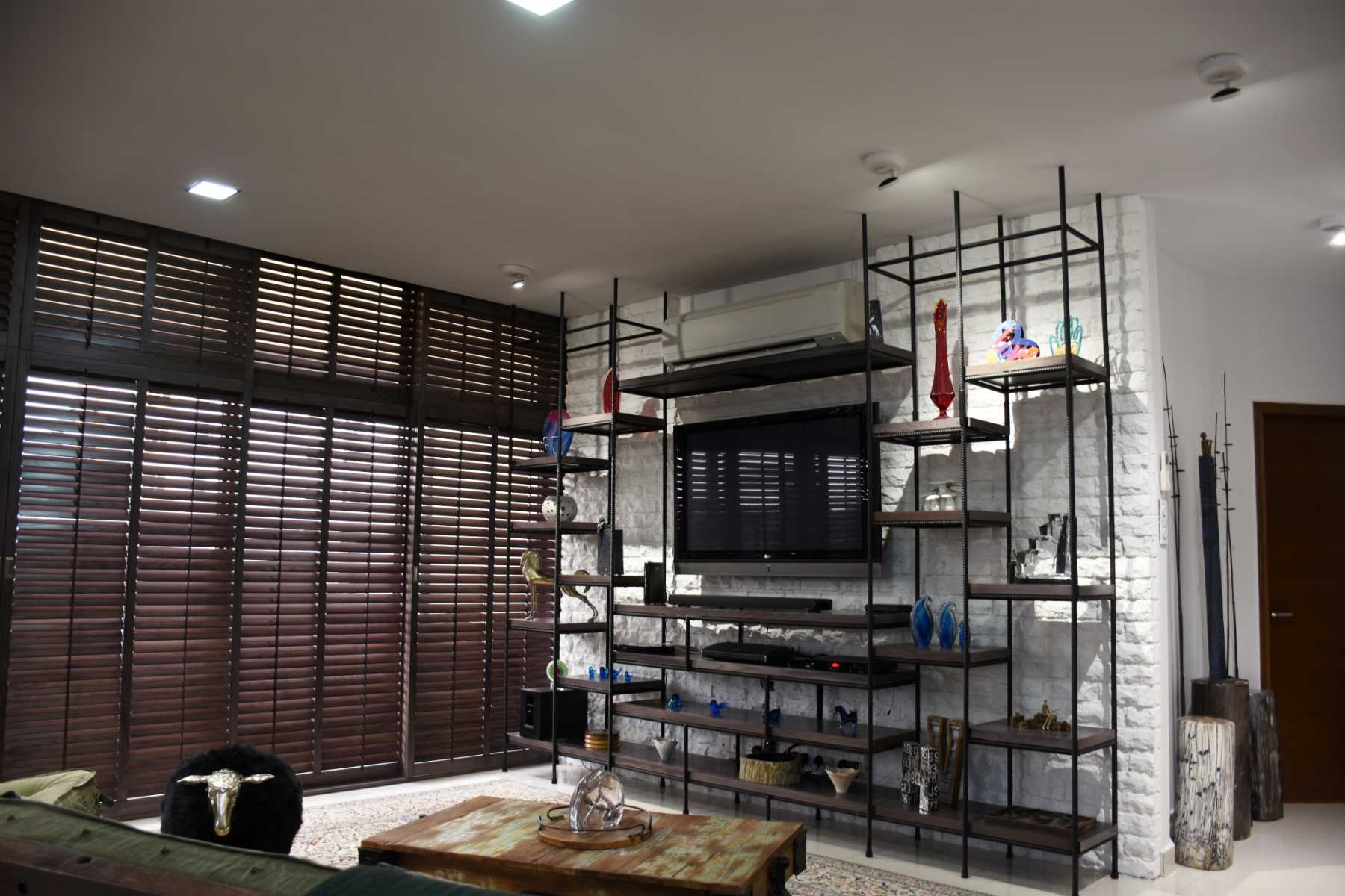 Industrial Living Room with TV Console and Feature Wall