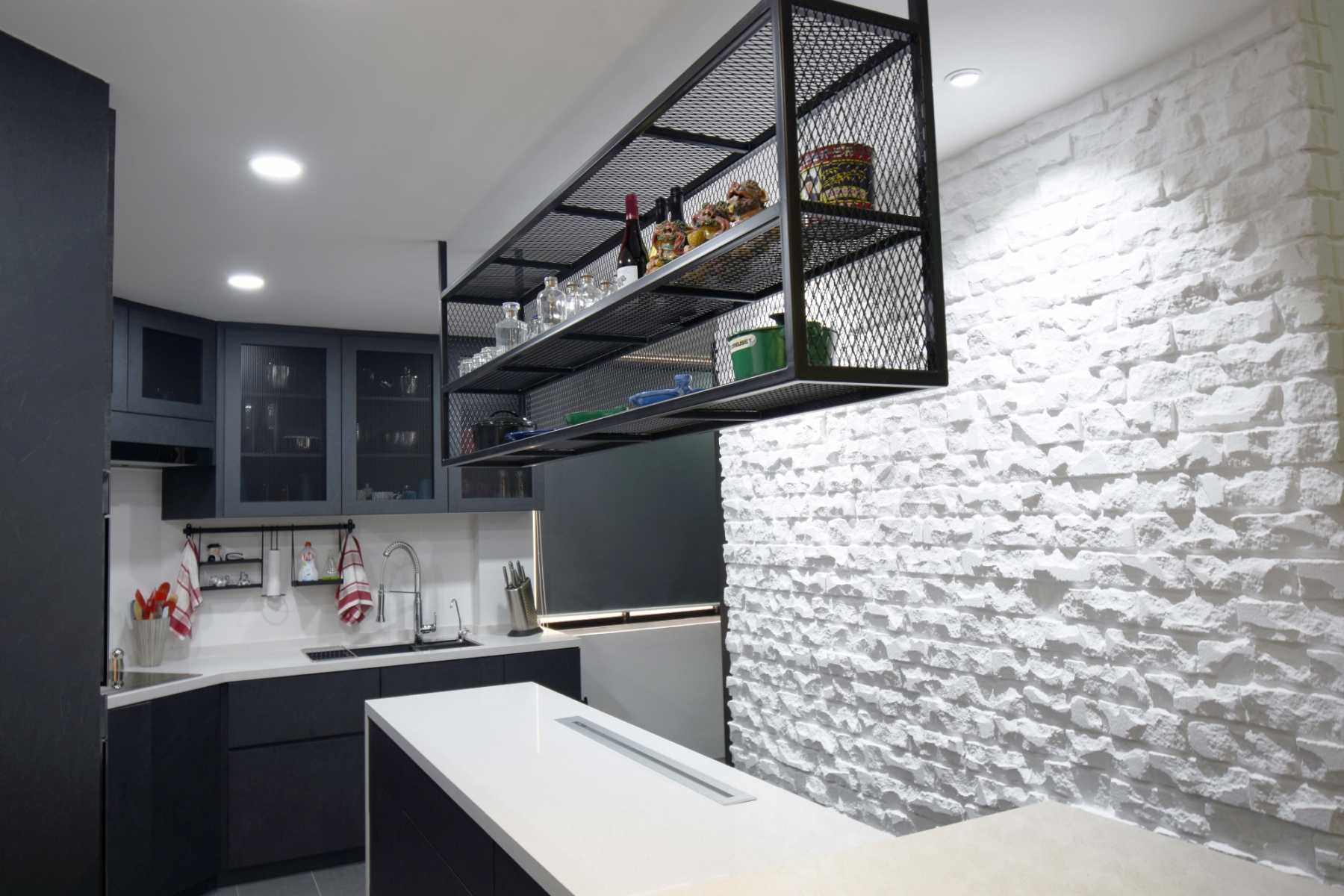 Industrial Kitchen with Countertop and Feature Wall
