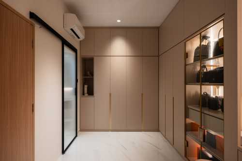 Contemporary Walk-in Wardrobe at Limau Villas