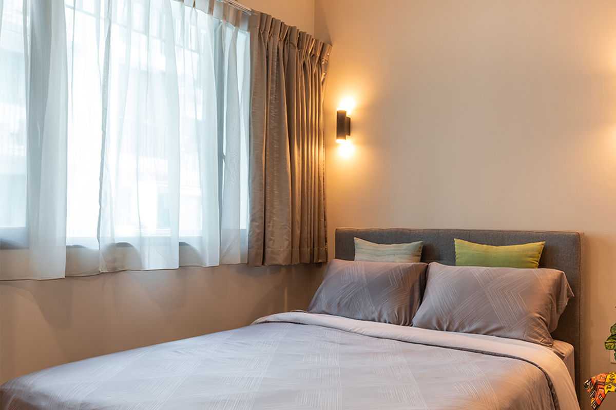 Contemporary Bedroom with Bay Window and Queen Bed
