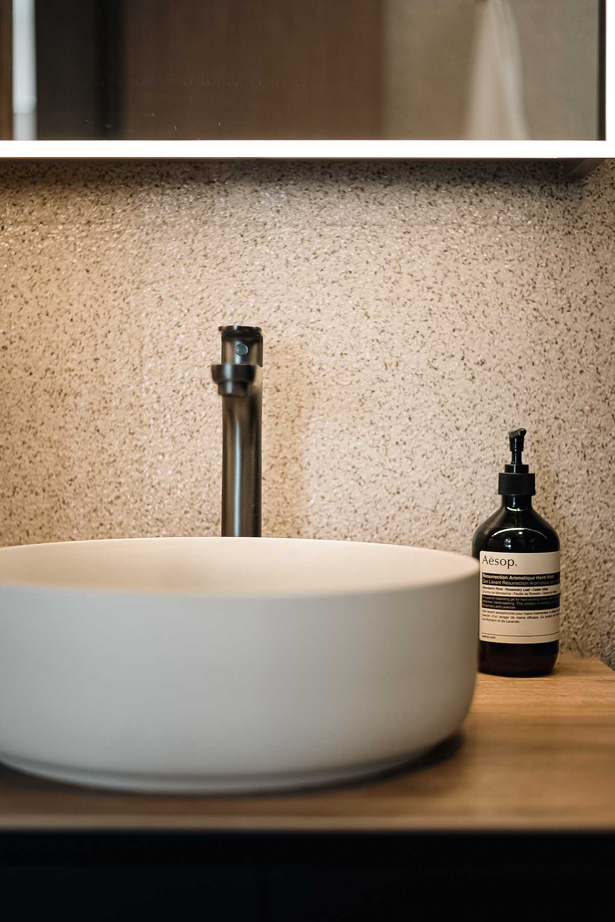 Minimalist Bathroom with Countertop and Mirror