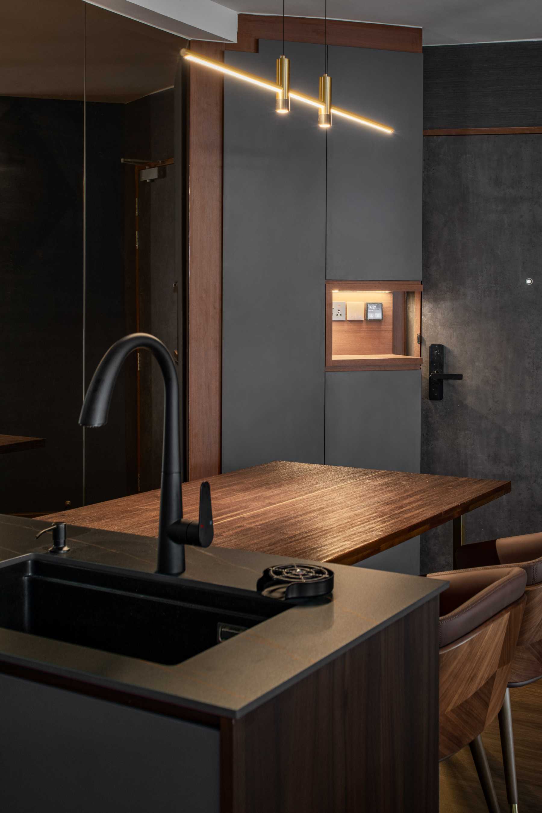 Contemporary Dining Room with Drop Light and Dining Table