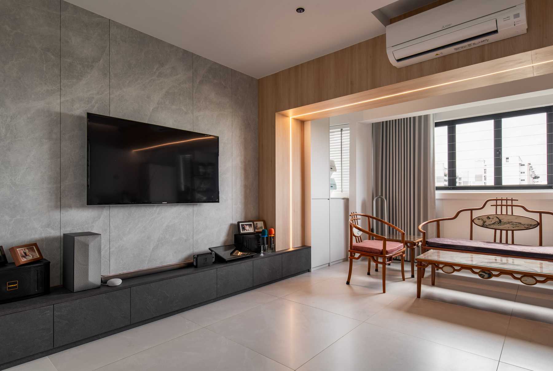 Scandinavian Living Room with Homogeneous Tiles and TV Console