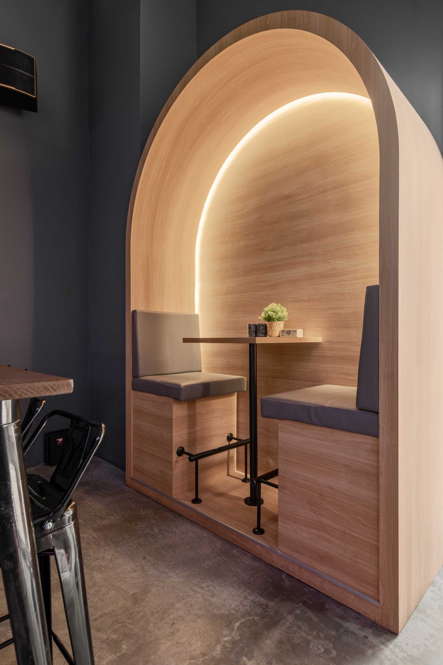 Contemporary Restaurant with Feature Wall and Dining Table