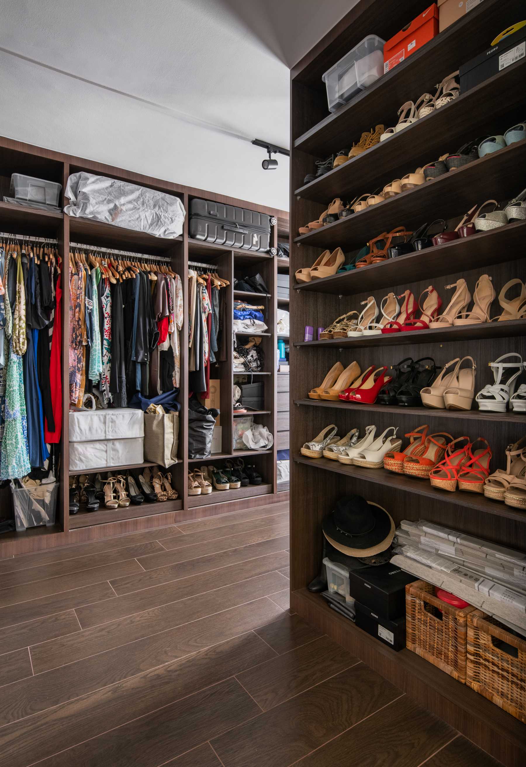 Country Walk-in Wardrobe with Wood Flooring and Wardrobe