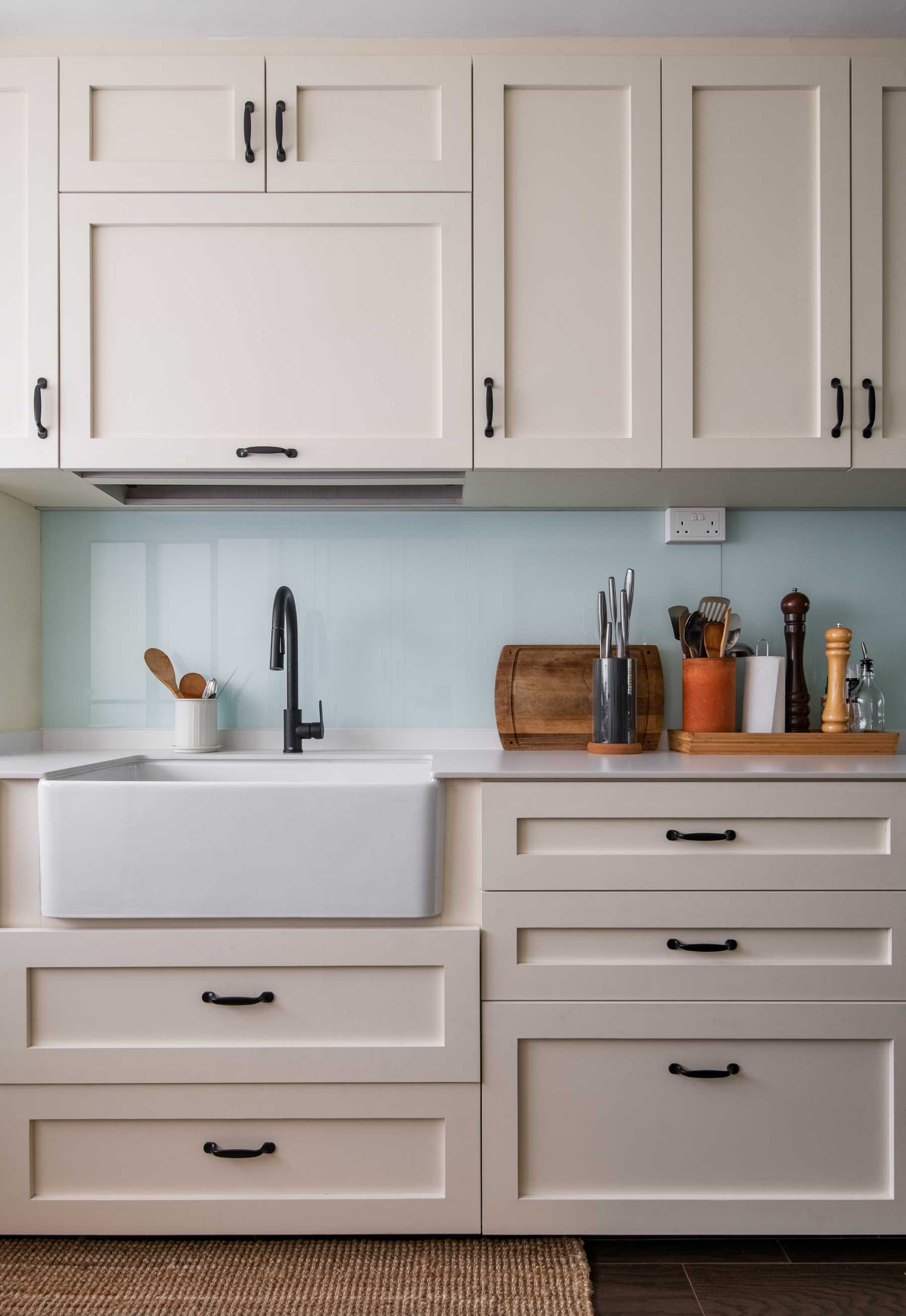 Country Kitchen with Wood Flooring and Kitchen Backsplash