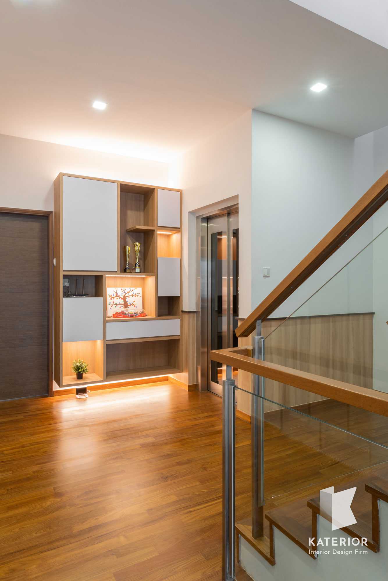 Scandinavian Hallway with Bookshelf and Staircase