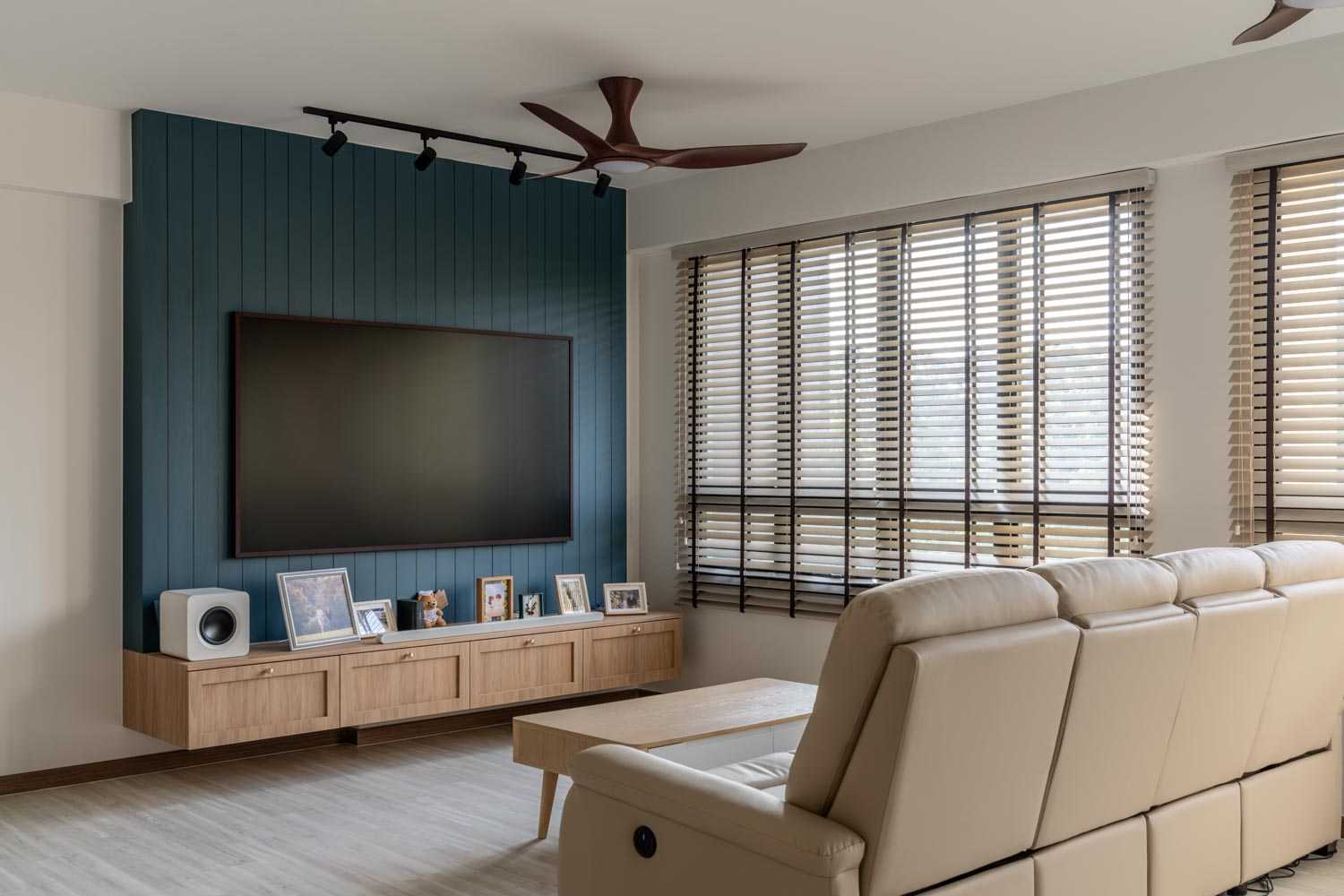 Country Living Room with Wood Flooring and TV Console
