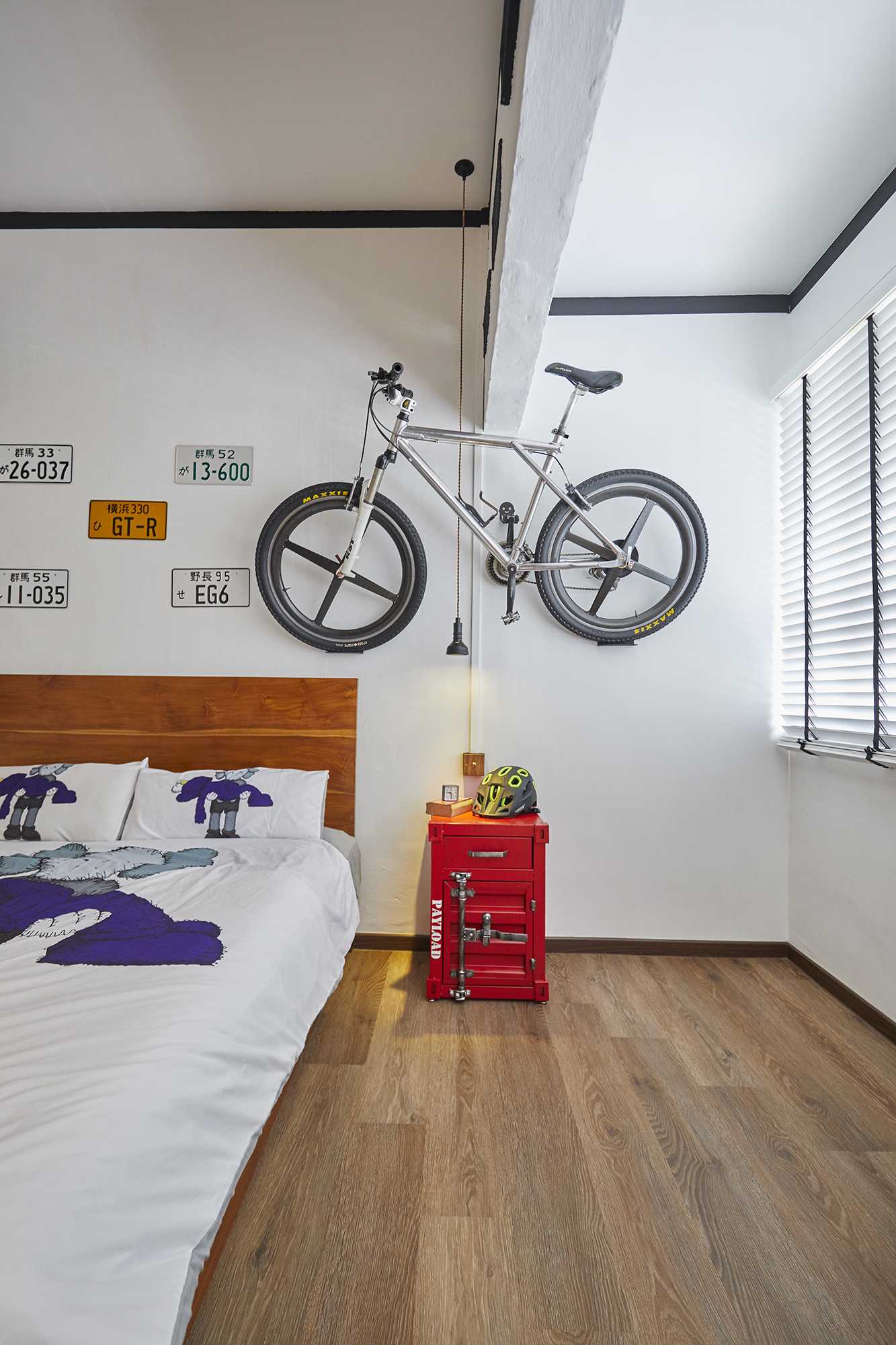 Asian Bedroom with Cement Floor and Wardrobe