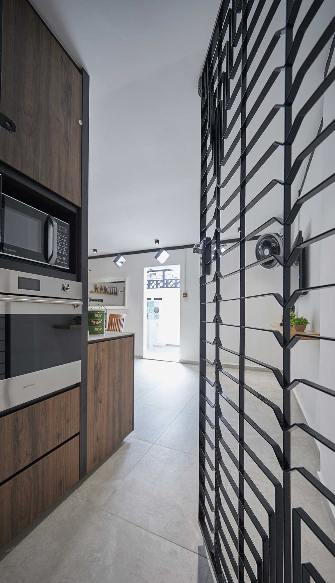 Asian Kitchen with Herringbone Tiling and Marble Floor