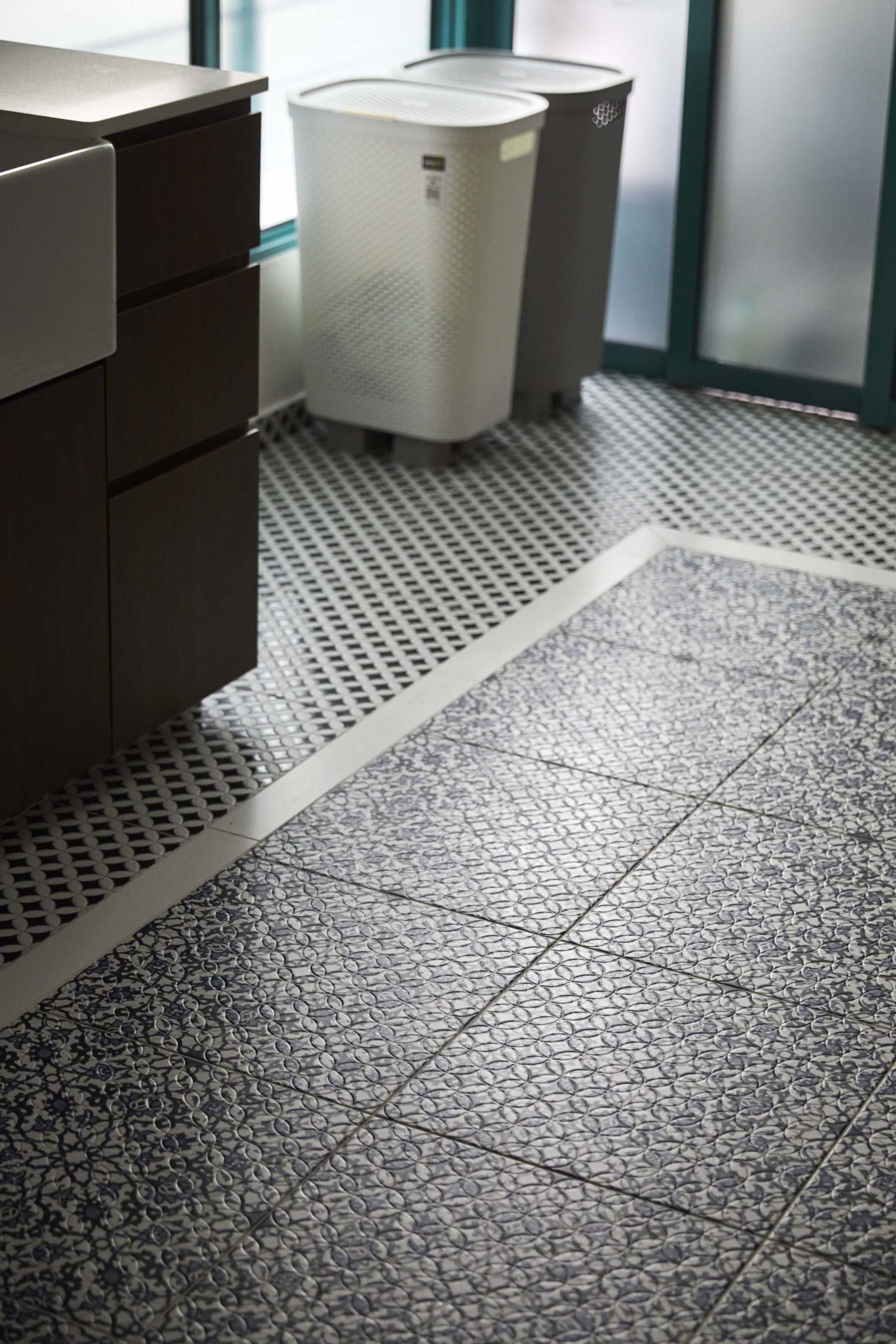 Scandinavian Bathroom with Homogeneous Tiles and Wood Flooring