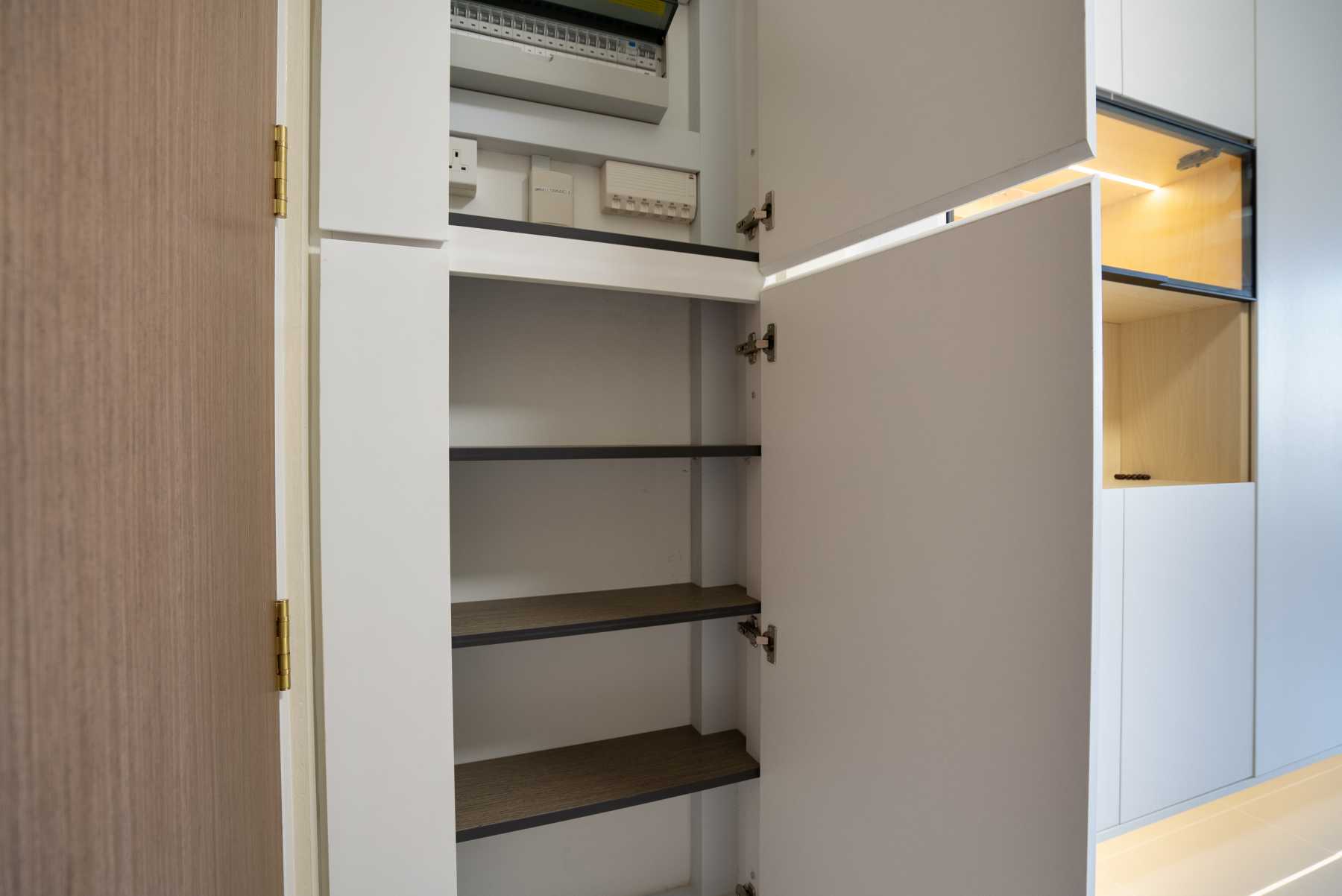 Minimalist Living Room with Display Cabinets and Shoe Cabinets