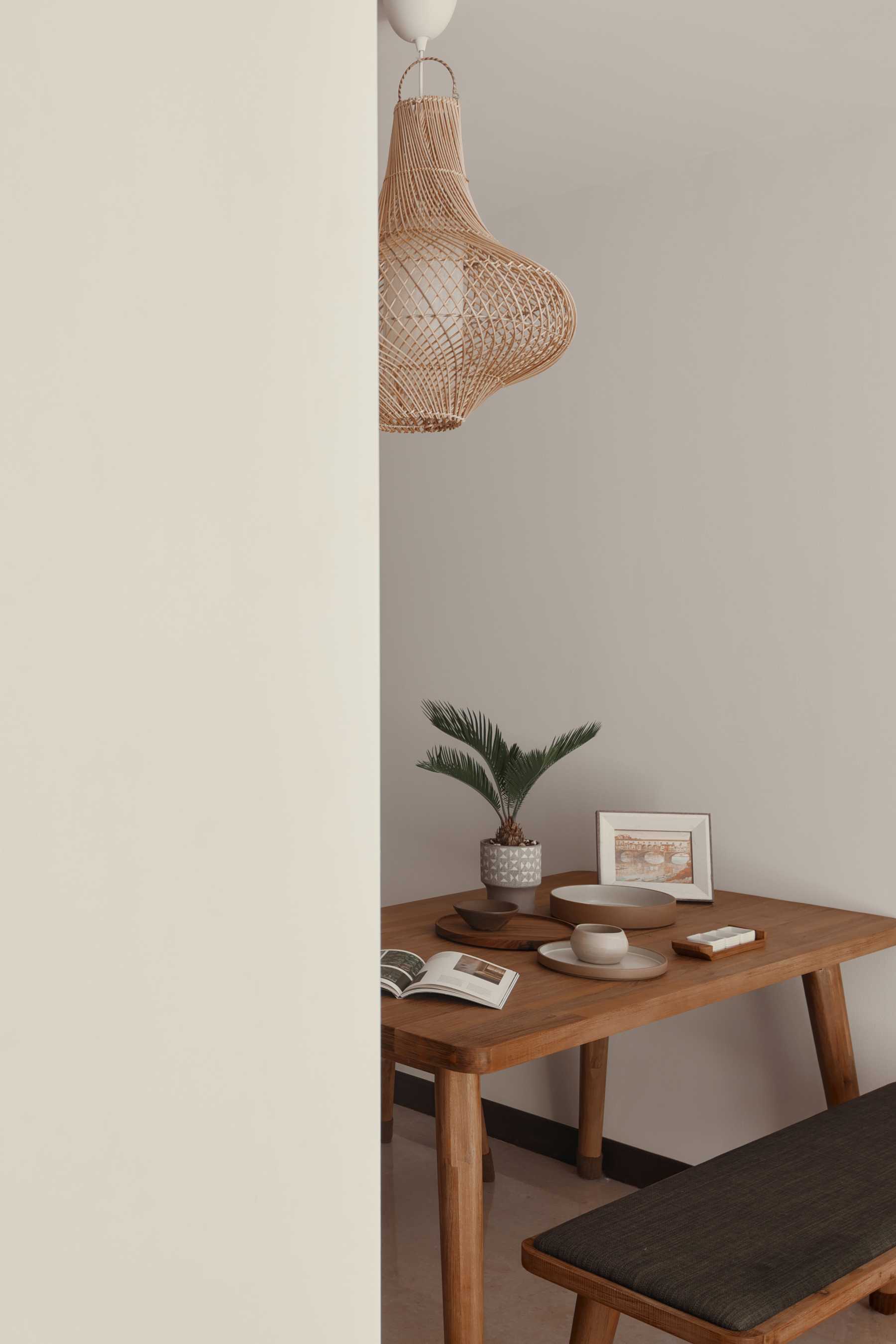 Modern Dining Room with Drop Light and Dining Table