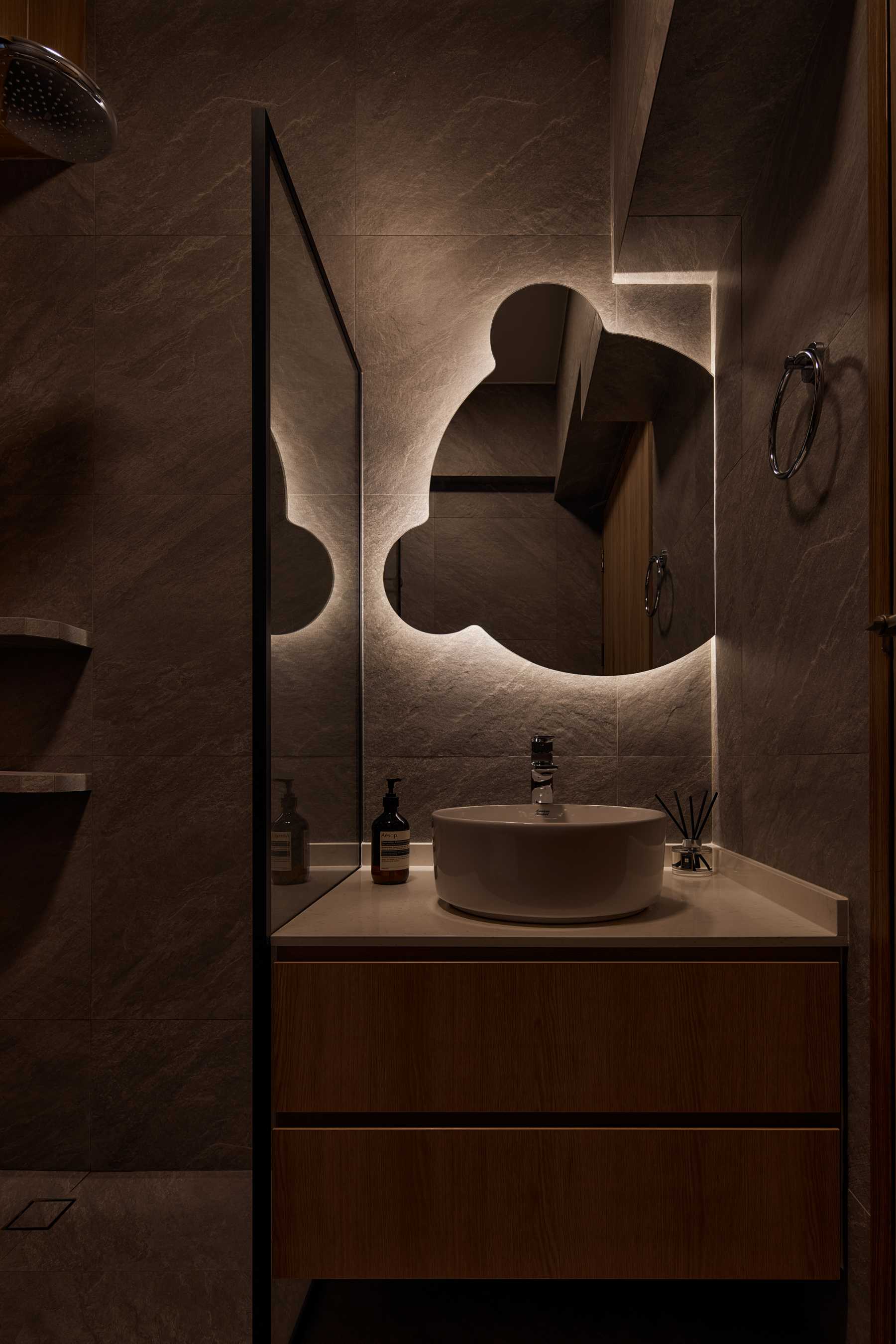 Minimalist Bathroom with Granite Floor and Mirror