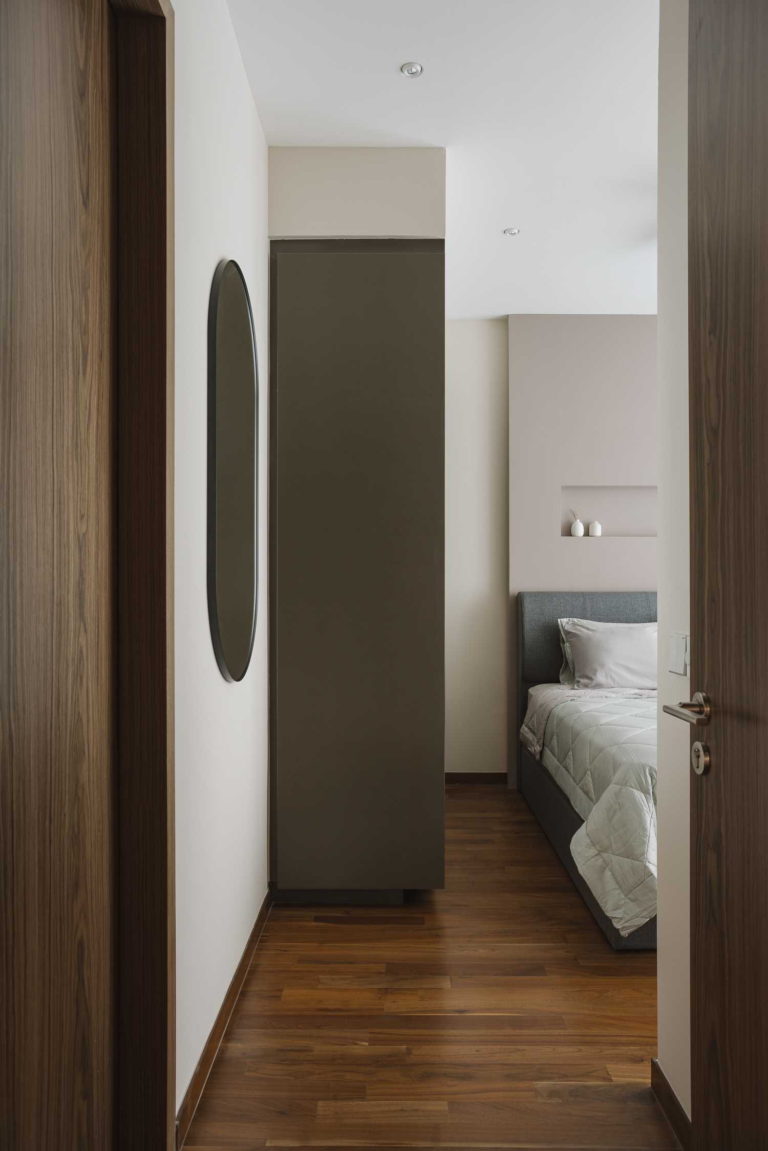 Modern Bedroom with Parquet Floor and Mirror