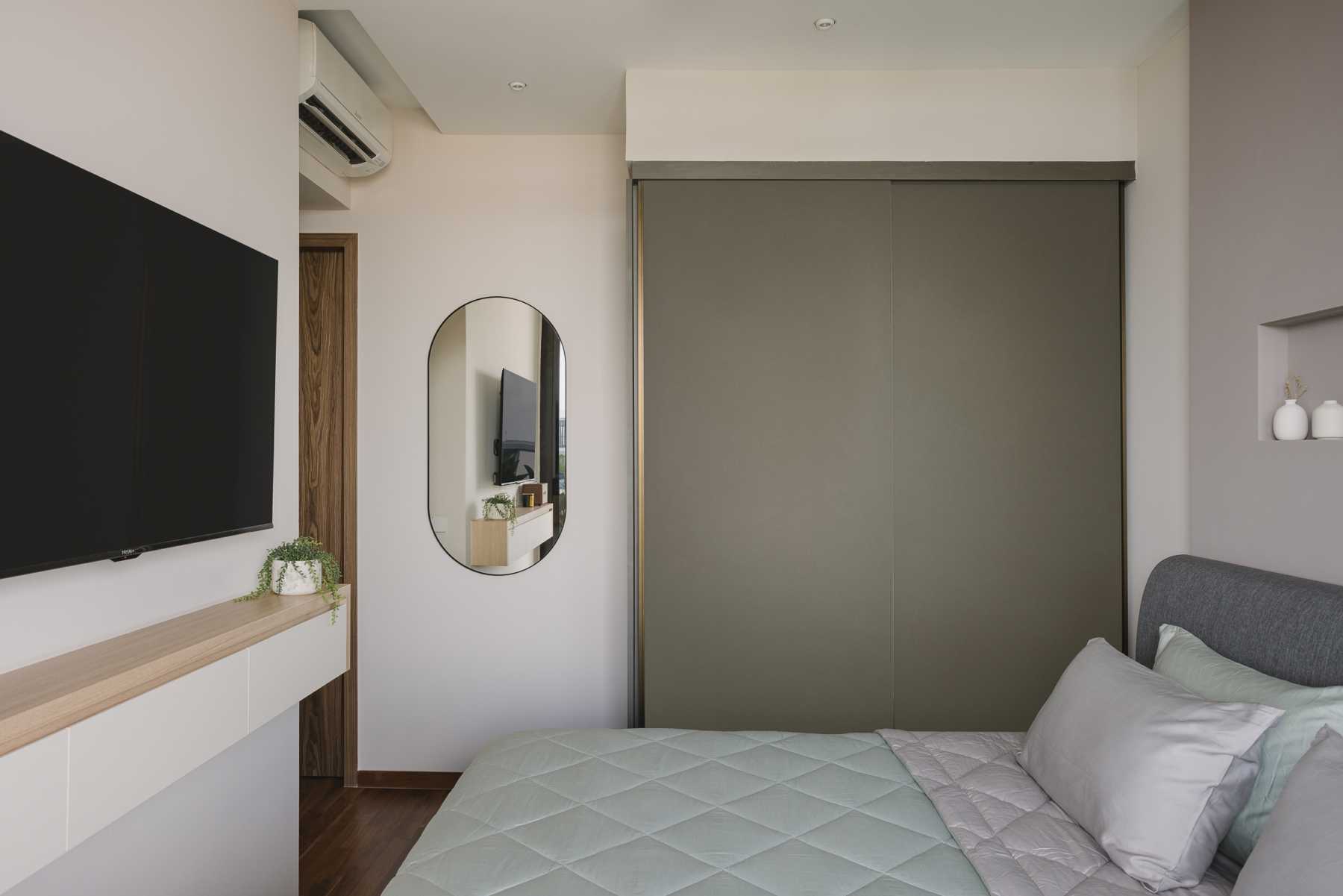 Modern Bedroom with TV Console and Mirror