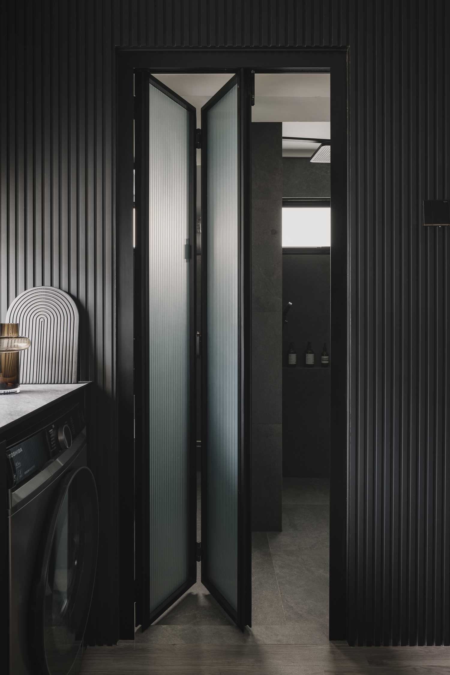 Modern Bathroom with Countertop and Washing Machine