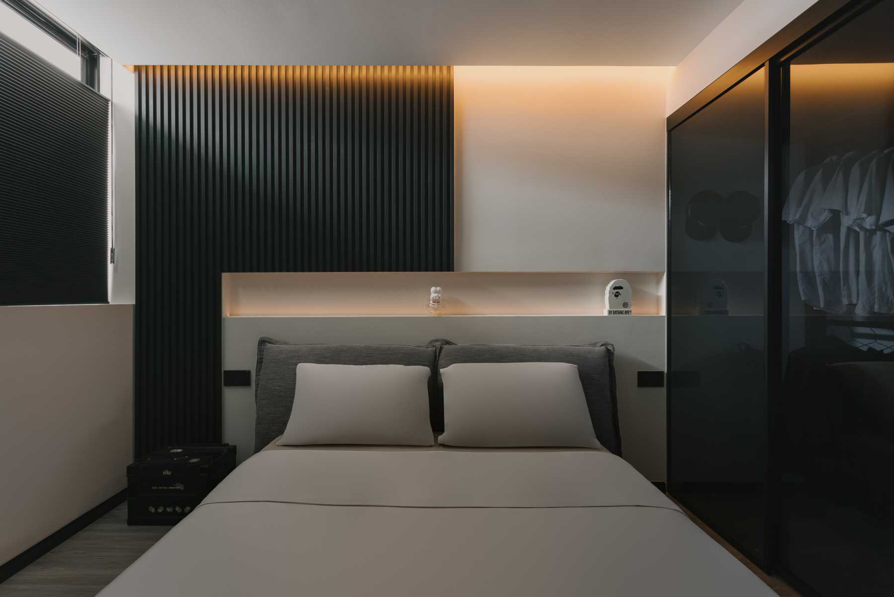 Modern Bedroom with Cove Lighting and Wardrobe