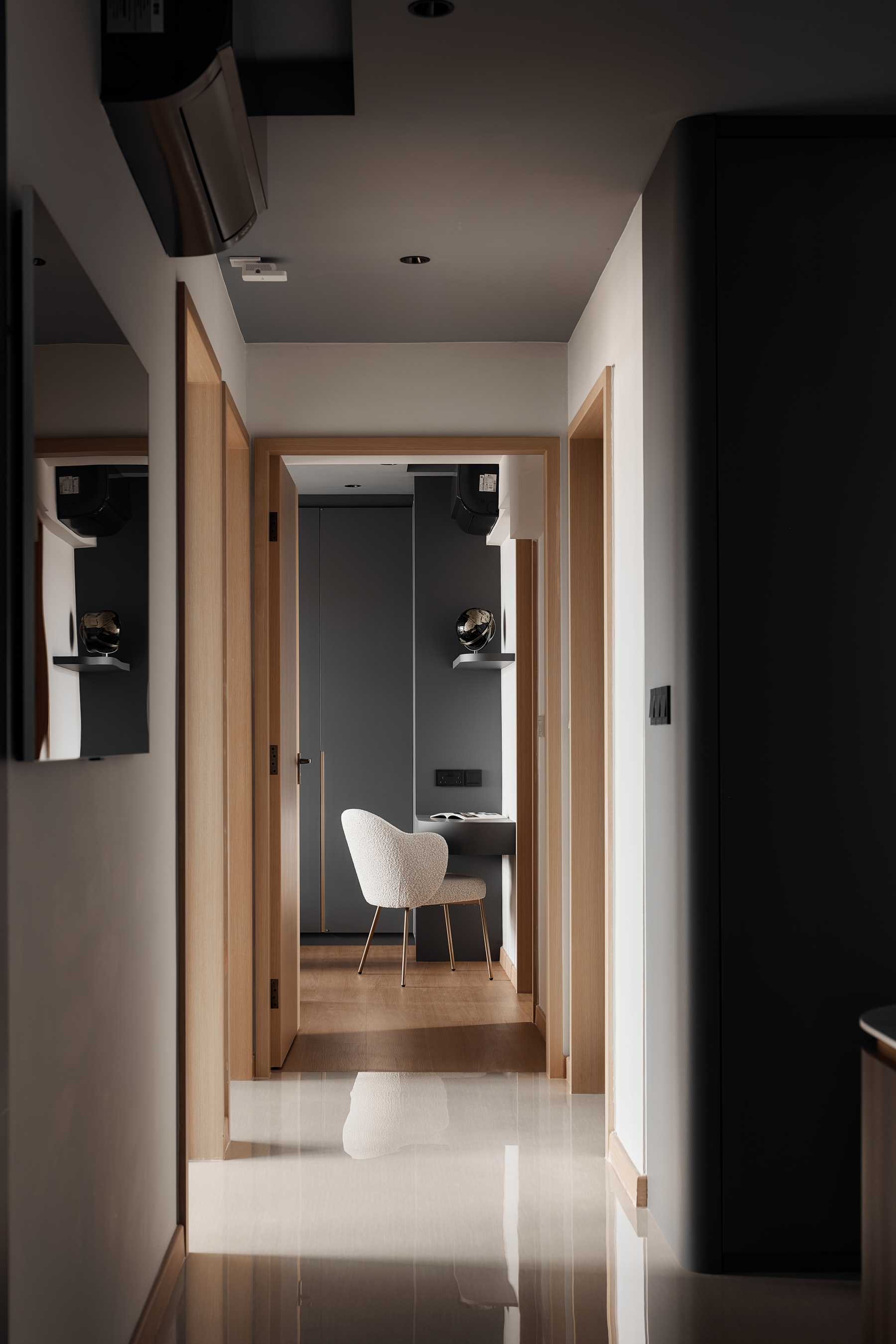 Modern Foyer with TV and Lighting