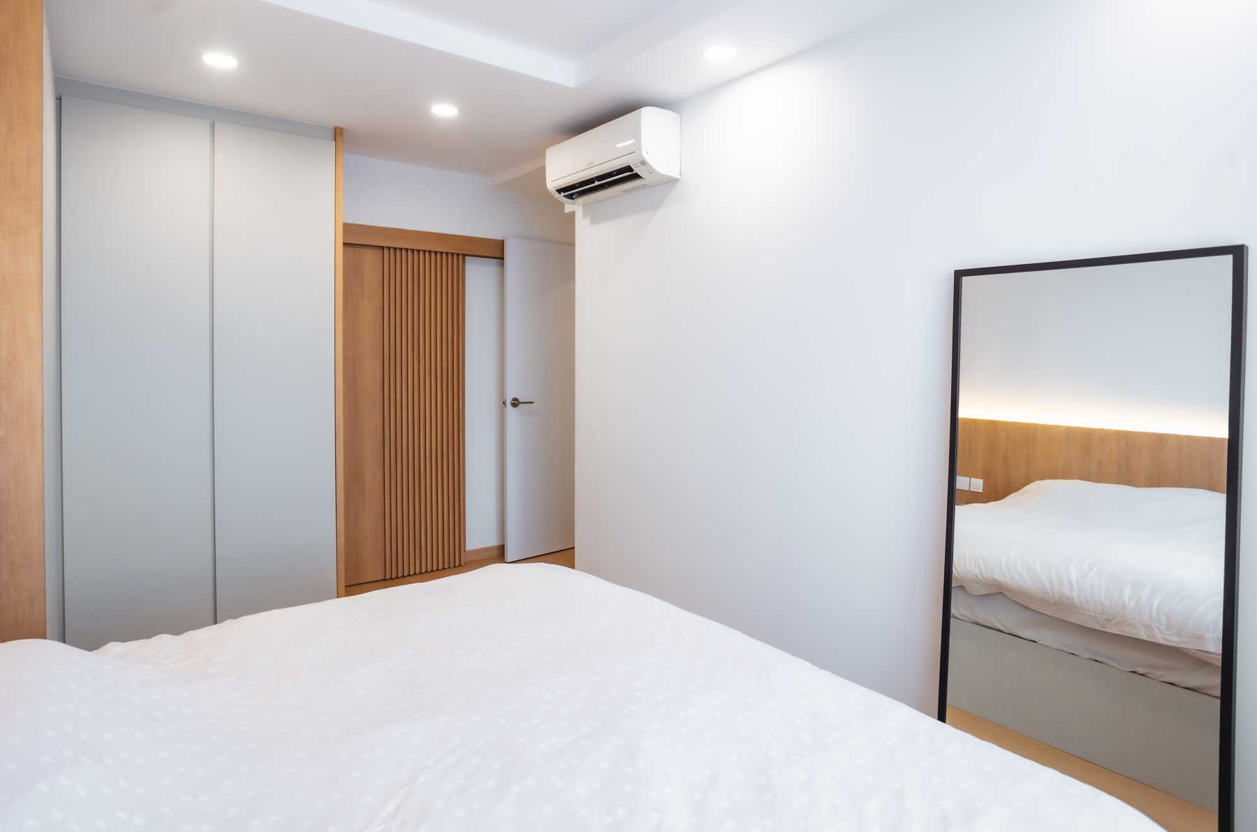 Modern Bedroom with Ceiling Light and Wardrobe