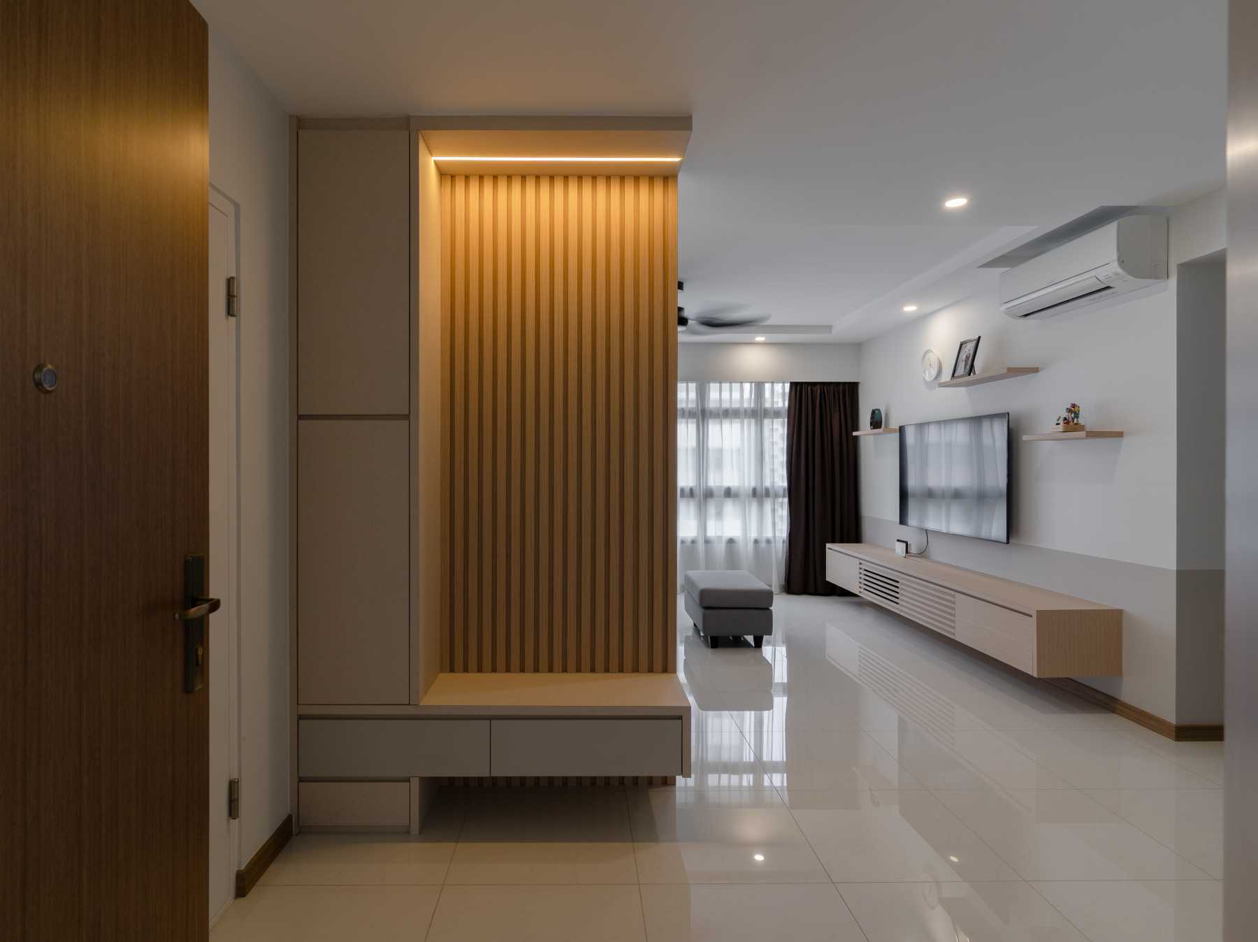 Scandinavian Foyer with Artwork and Small Storage