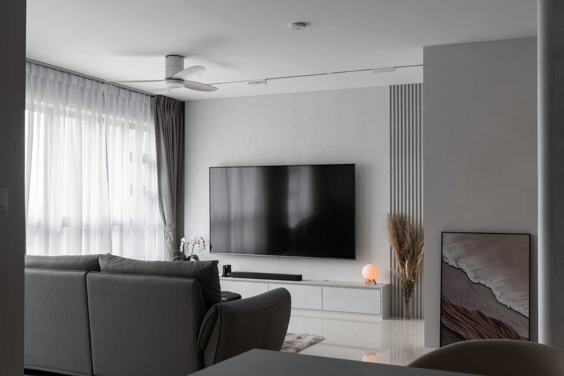 Minimalist Living Room with TV Console and Feature Wall